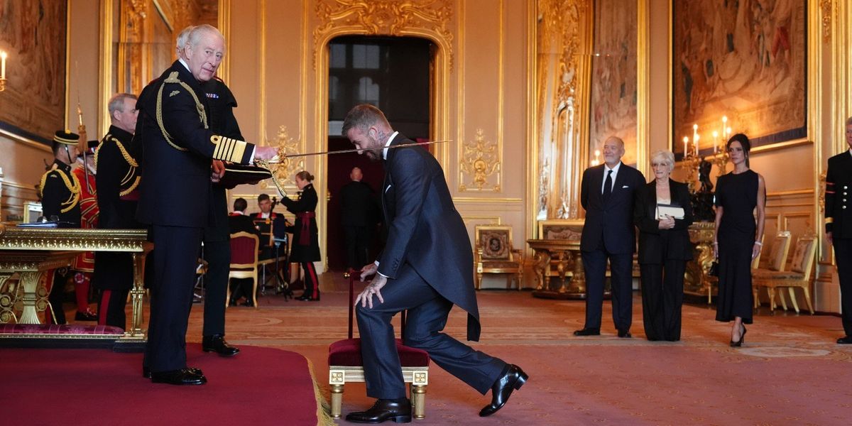 King Charles bestows knighthood on David Beckham in emotional ceremony as Victoria watches on thumbnail