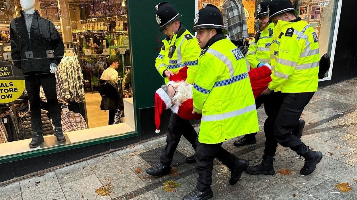 Father Christmas arrested during Palestine Action protest and shouts at police: 'Going on the naughty list!'