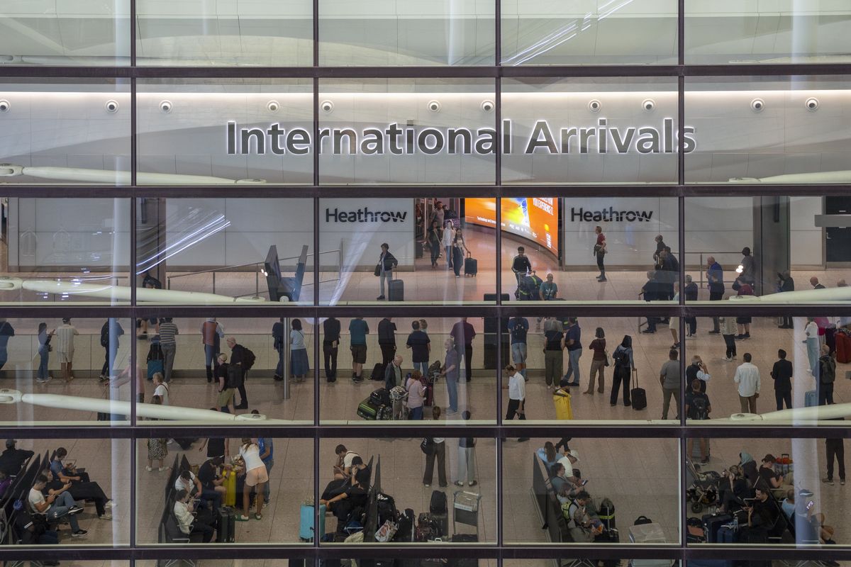 Heathrow Airport terminal 'locked down' as armed police rush to scene