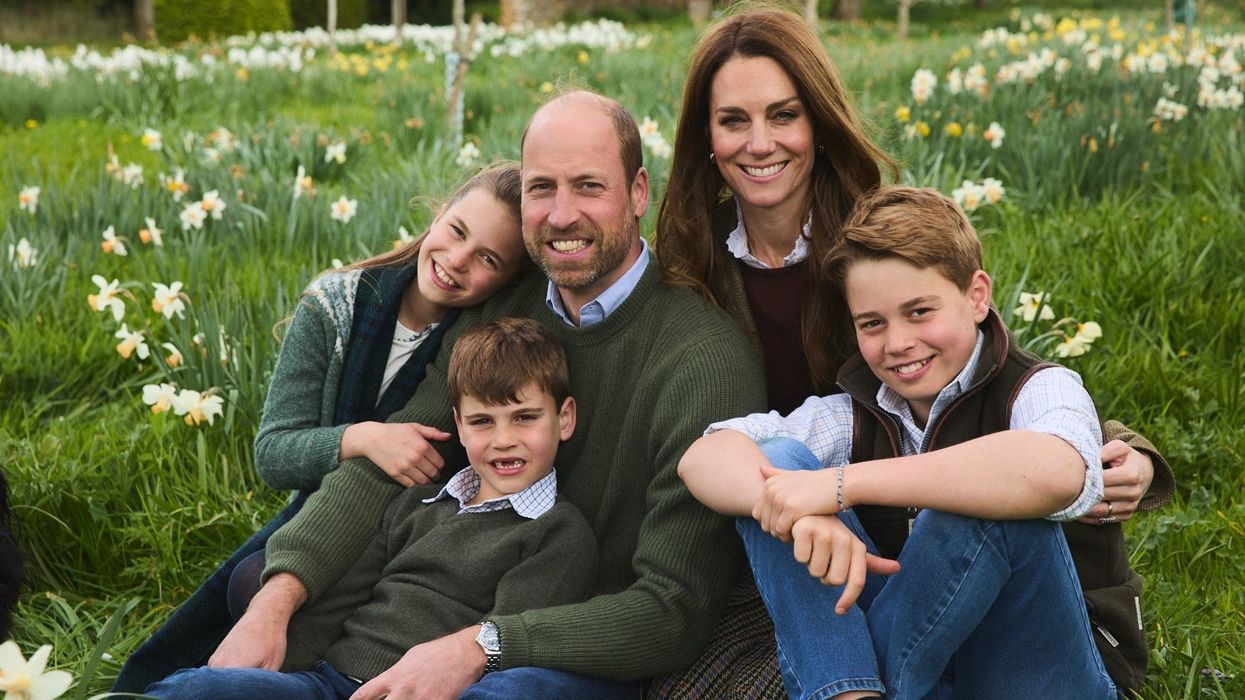 Kate and William share new family photo as George, Charlotte and Louis beam in couple's Christmas card