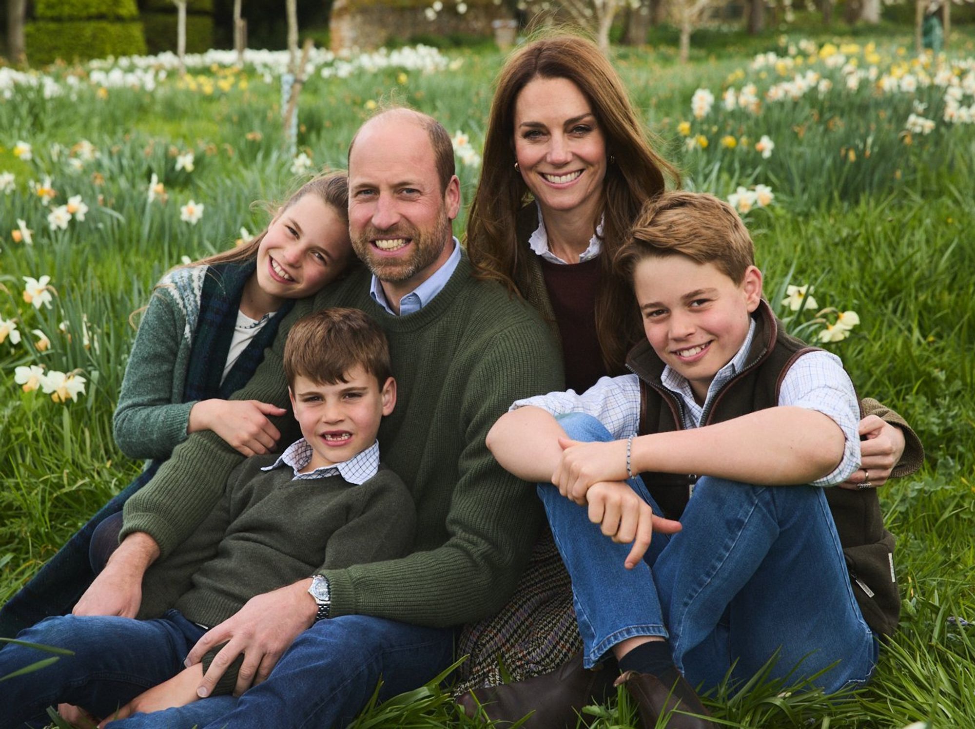 Kate and William share new family photo as George, Charlotte and Louis beam in couple's Christmas card