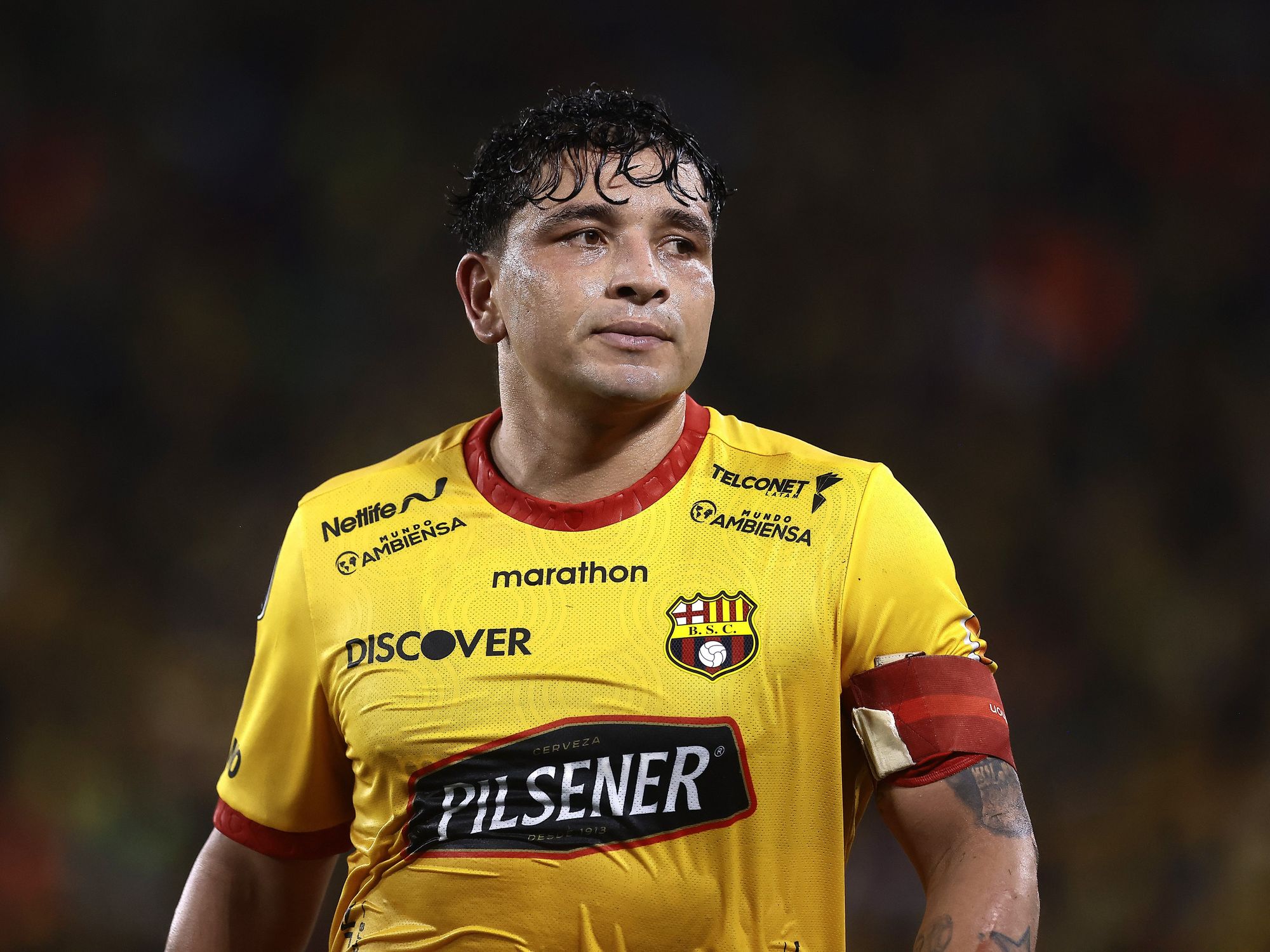 Footballer, 33, shot dead after 'two motorbikes pulled up and open fired' on him and his mother