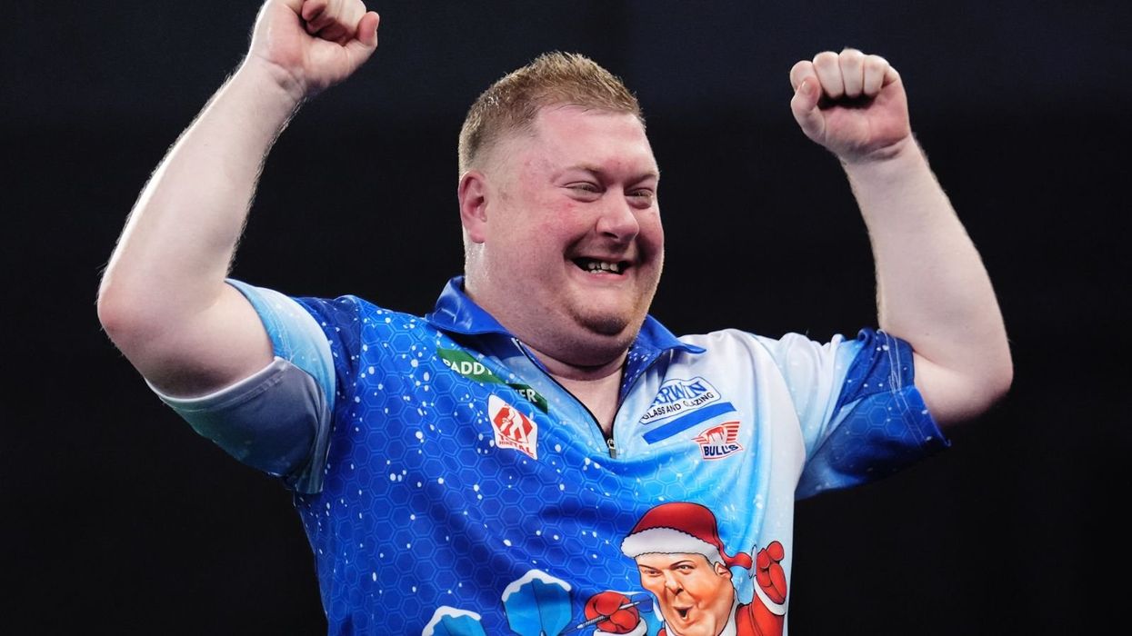 Darts star admits to Christmas dilemma after springing major upset at World Darts Championship