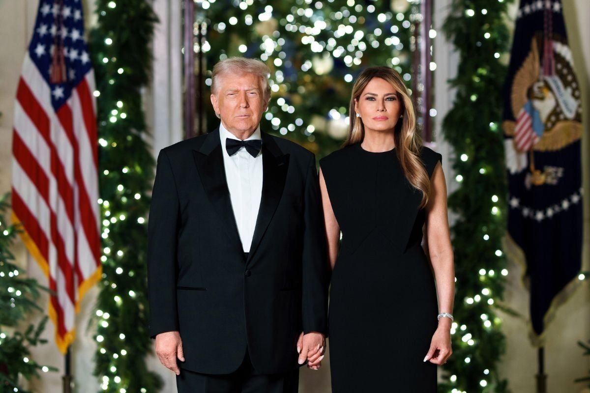 PICTURED: Donald Trump poses for White House Christmas portrait alongside wife Melania
