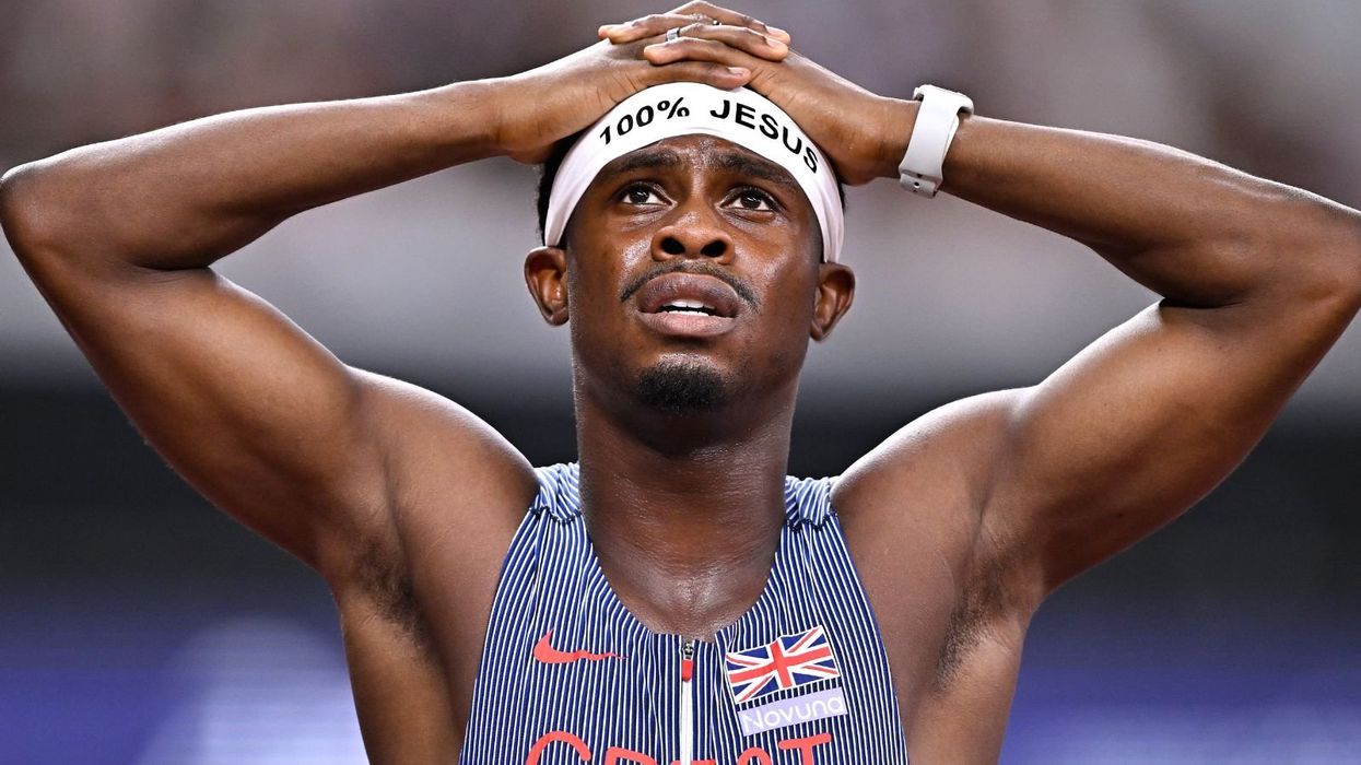 British sprinter who broke athletics rules with '100 per cent Jesus' headband opens up on power of Christianity when he competes