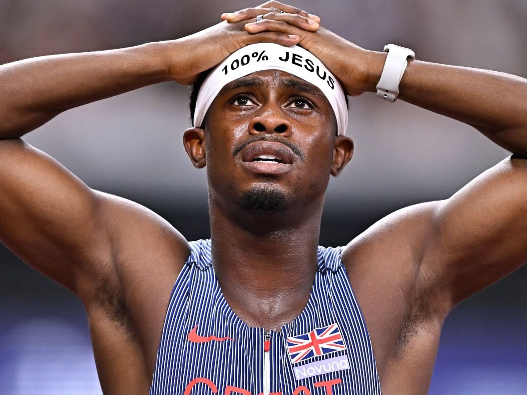 British sprinter who broke athletics rules with '100 per cent Jesus' headband opens up on power o...
