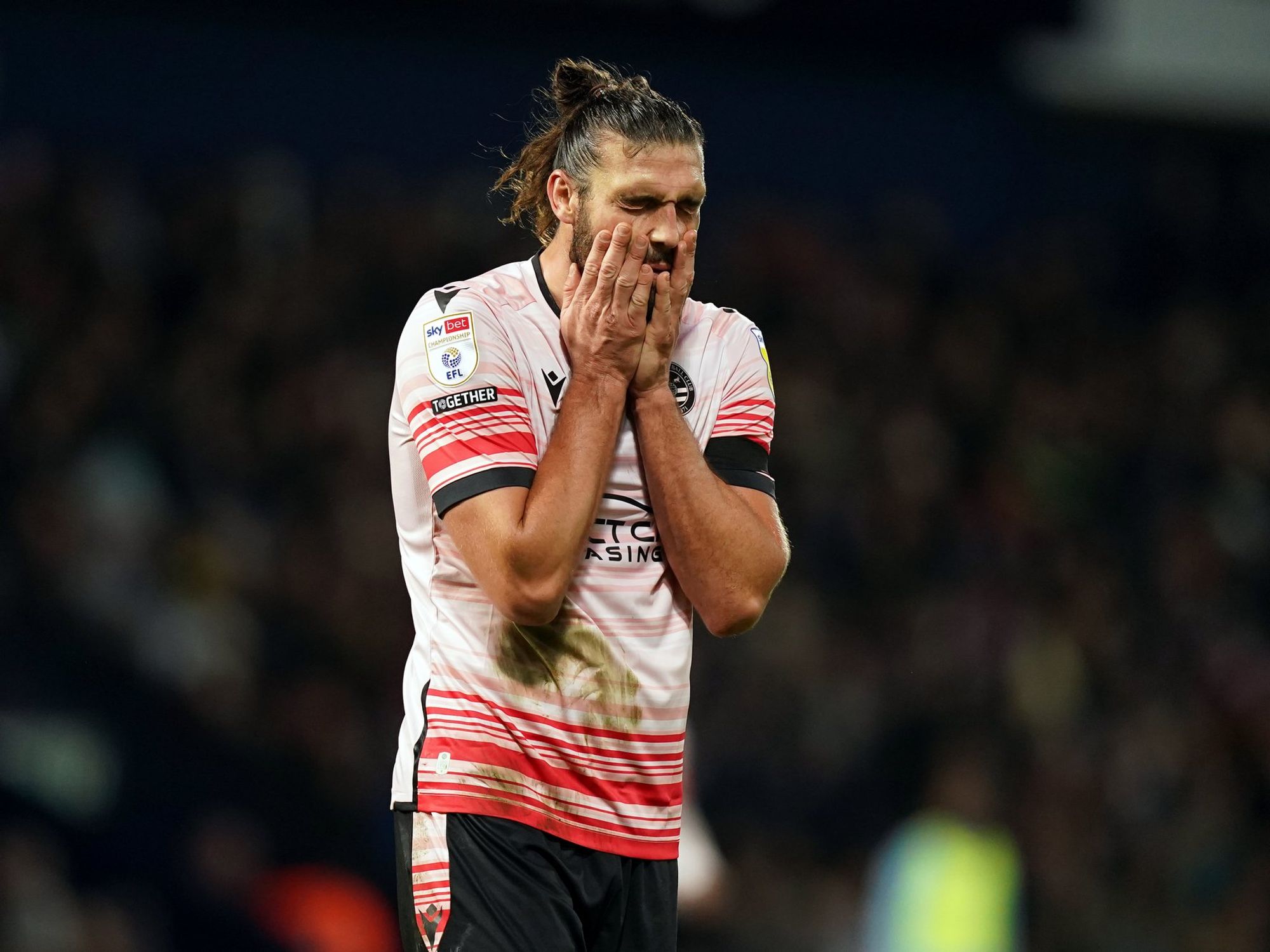 Former England star 'faces five years in prison' after being charged with breaking 'non-molestati...