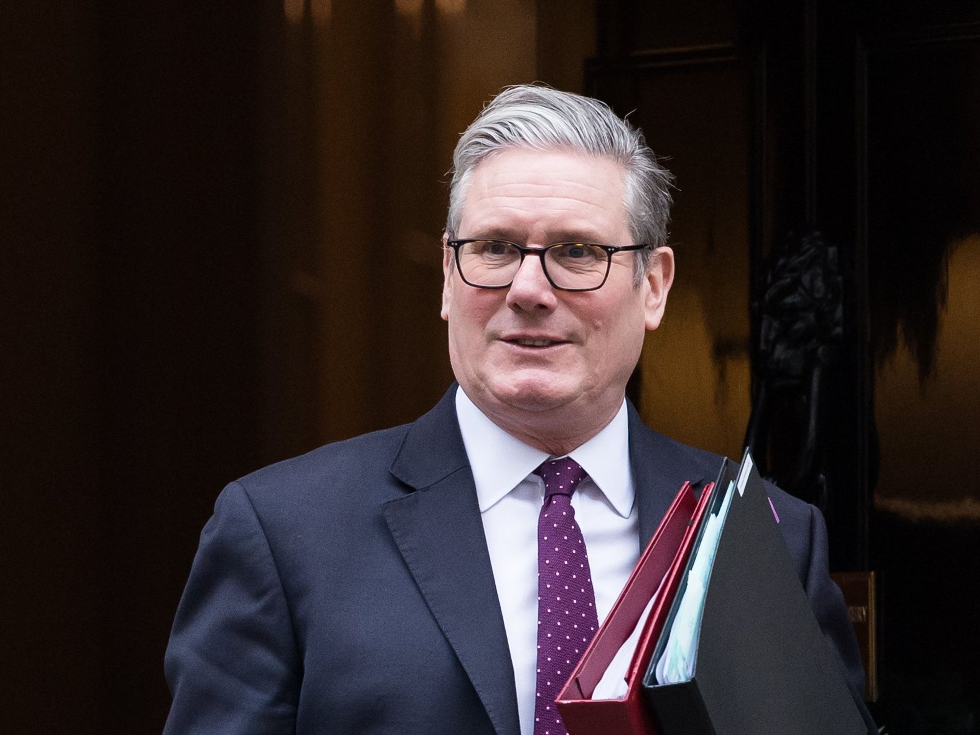 Keir Starmer suggests Labour rebels risk handing power to Nigel Farage as PM commits to 2027