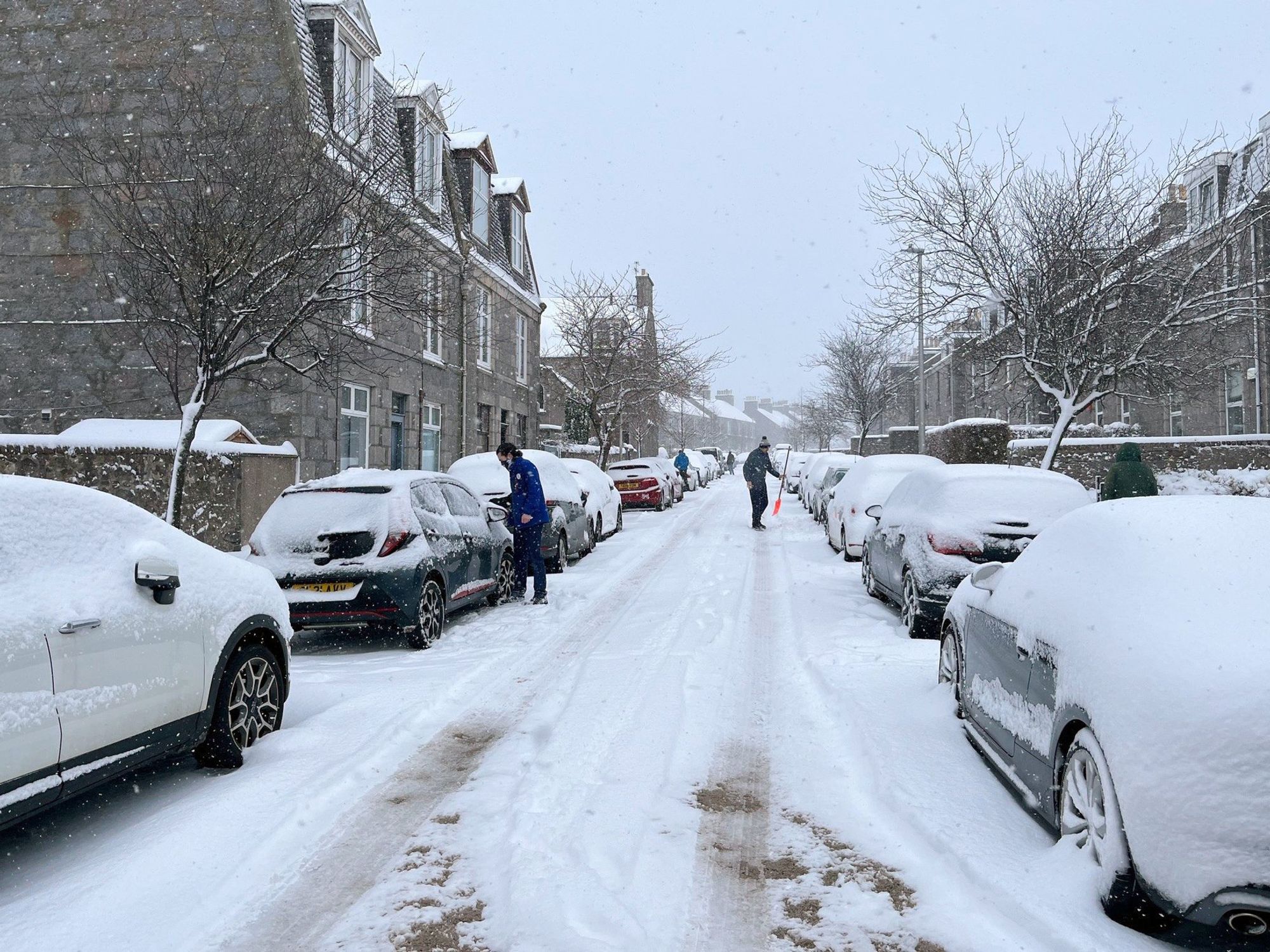 Dozens of schools closed across Britain as UK blanketed with snow amid amber warnings