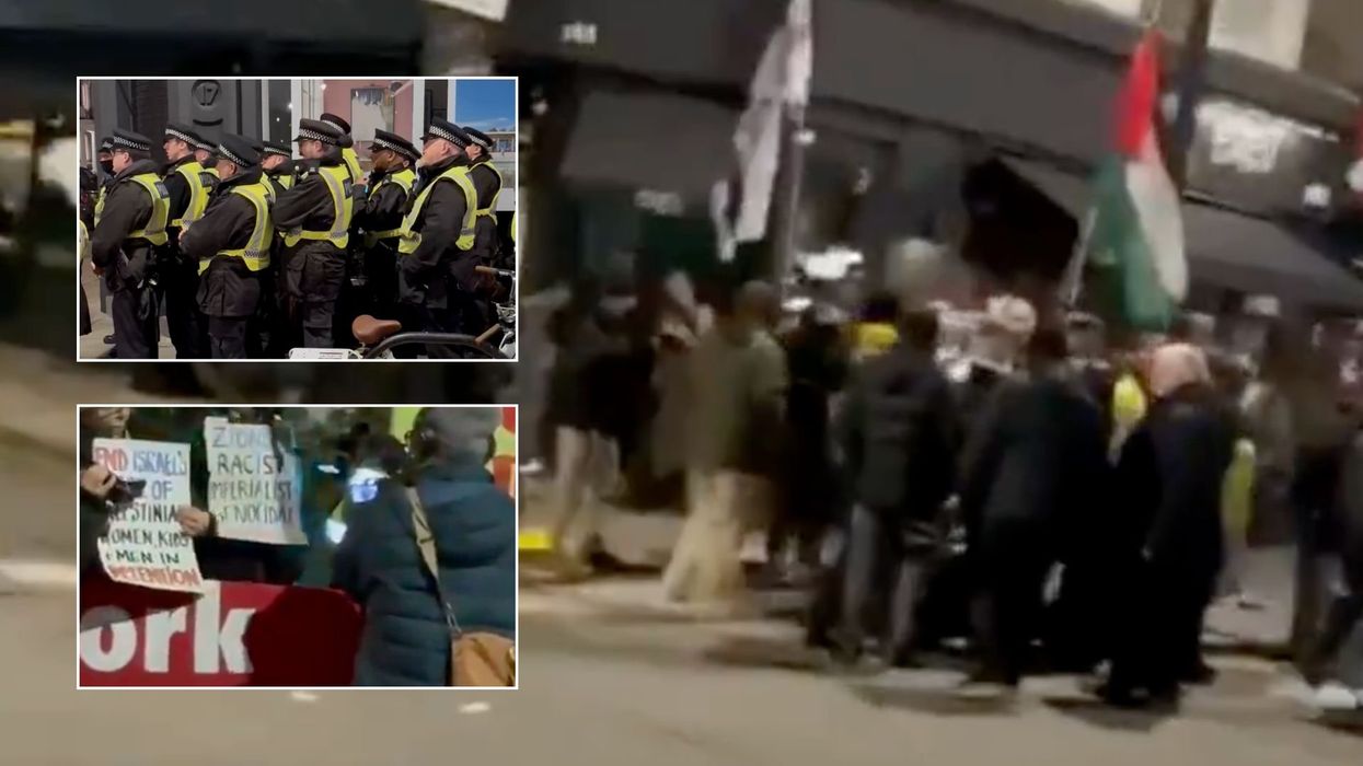 Police accused of 'standing by' while protesters target Israeli restaurant