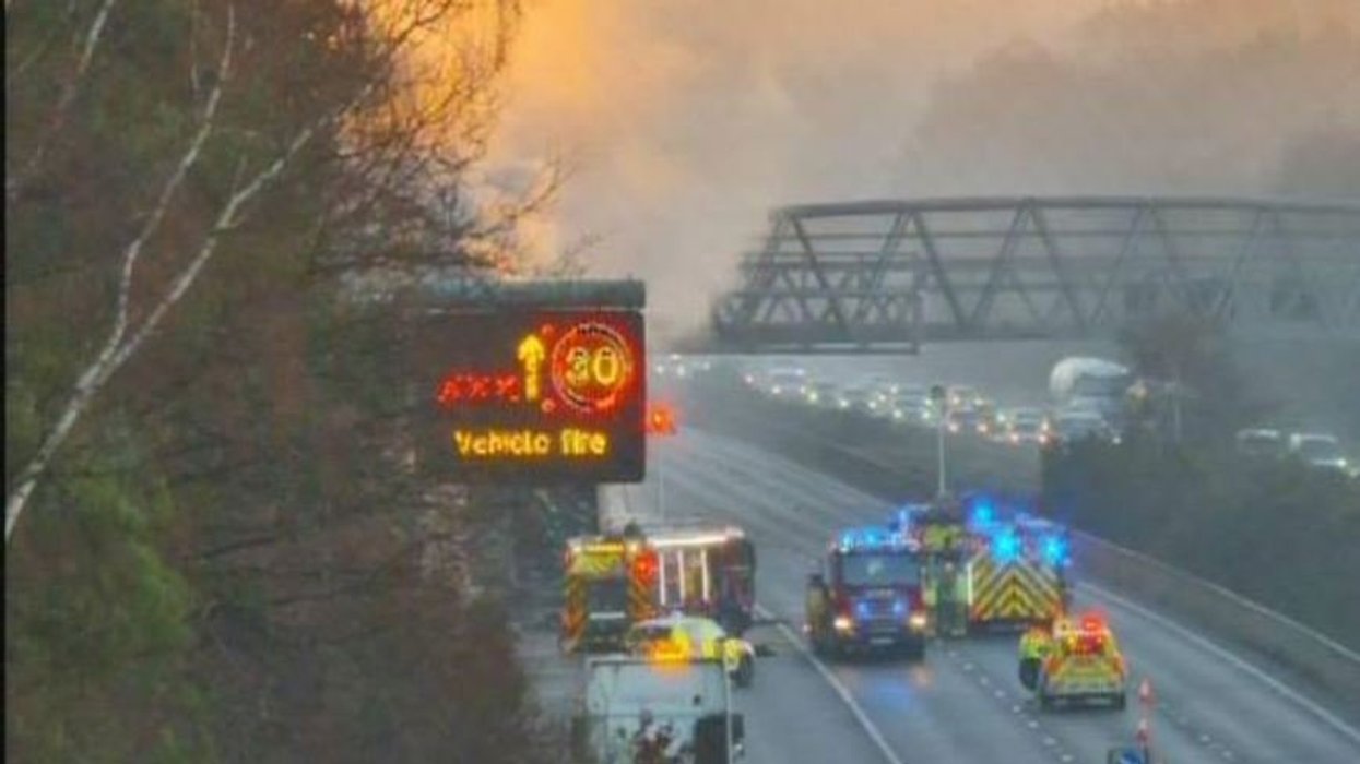 M3 traffic: Lorry carrying 'electrical waste' causes huge fire as drivers face 'large volumes of smoke'