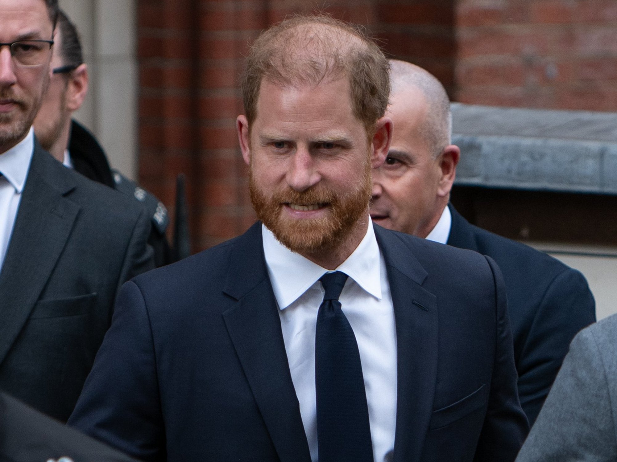 Prince Harry leaves court during break in proceedings as duke decides he will not return today