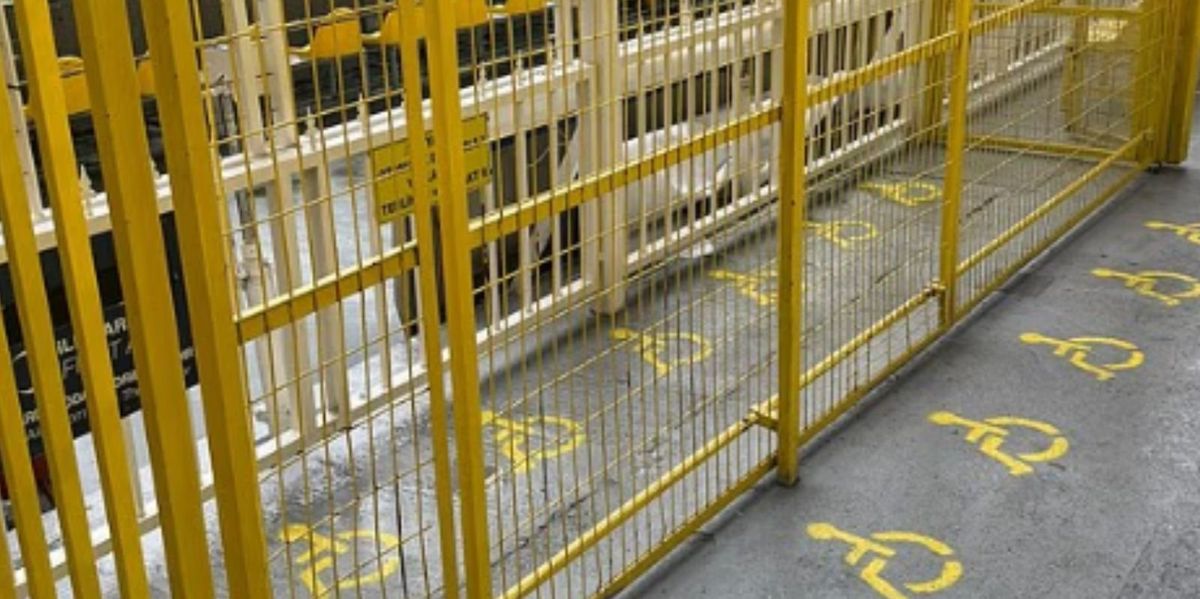Disabled fans forced to watch Europa League match in distressing conditions from yellow cage Disabled fans forced to watch Europa League match in distressing conditions from yellow cage