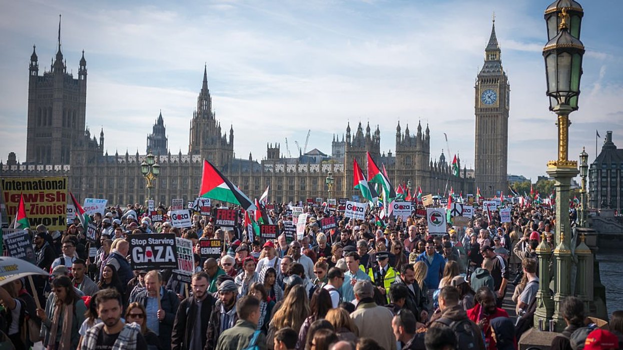 Three pro-Palestine protesters charged after calling for 'intifada' in first of its kind prosecution