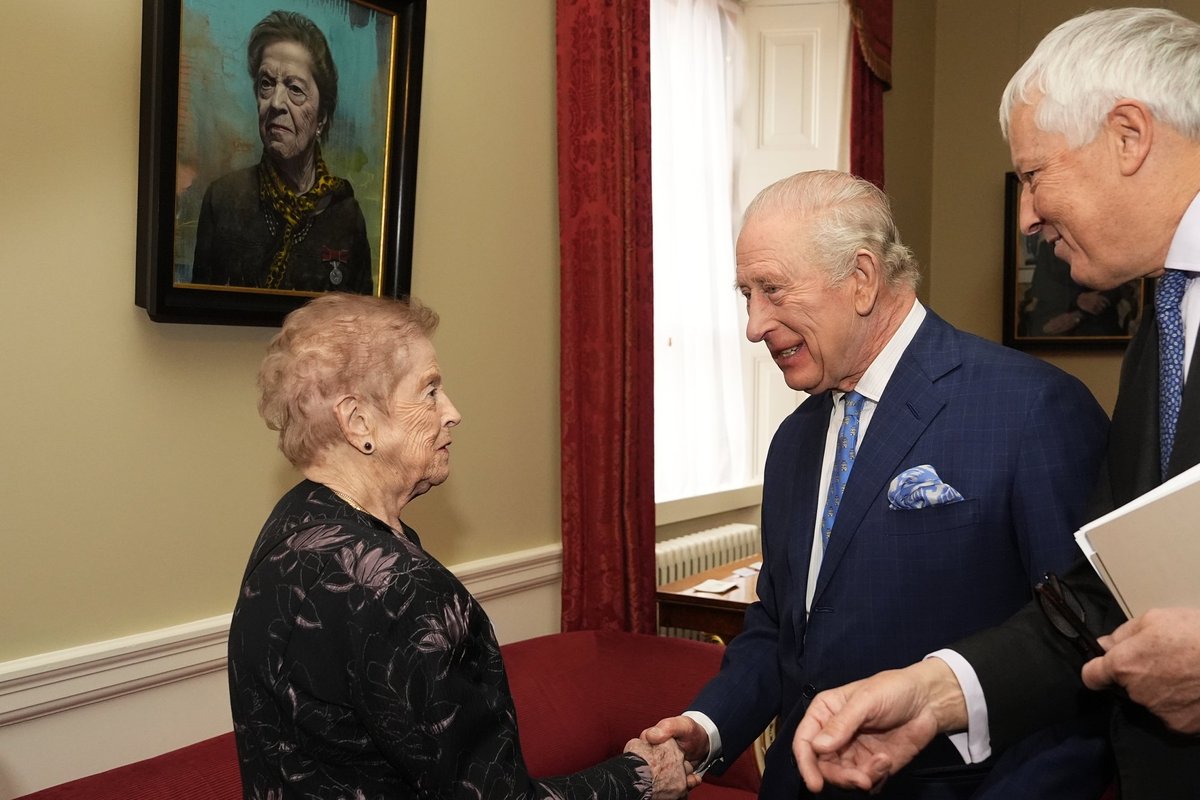 King Charles and Queen Camilla meet with Holocaust survivors and their relatives at Buckingham Palace