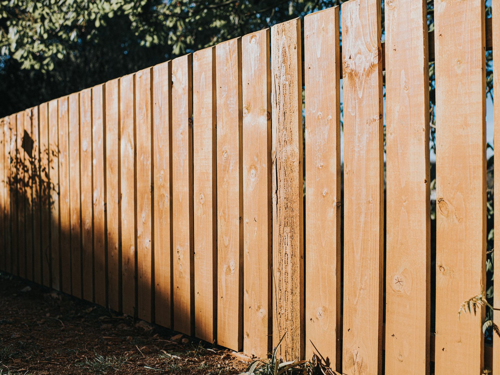 Retired teacher embroiled in row with neighbour 'stealing garden and ripping up decking'