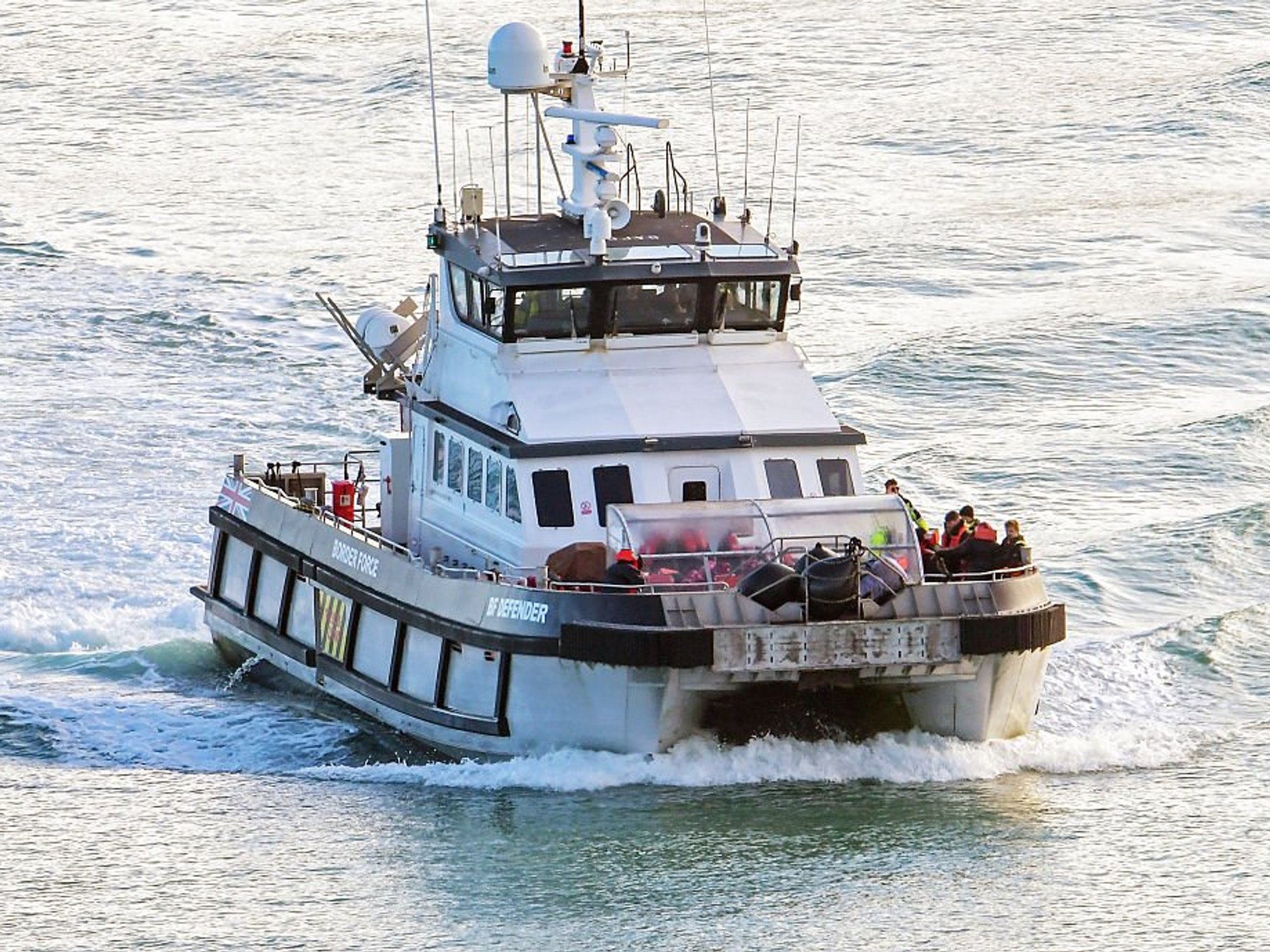 Immigration officer who 'stole money from small boat migrants' was an illegal immigrant, court hears