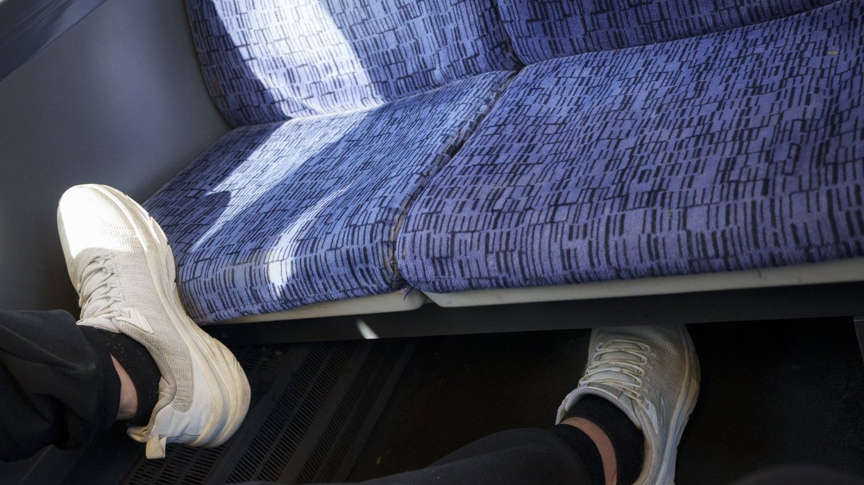 More than half of Britons want to see 'rude' commuters fined £20 for putting their feet on chairs