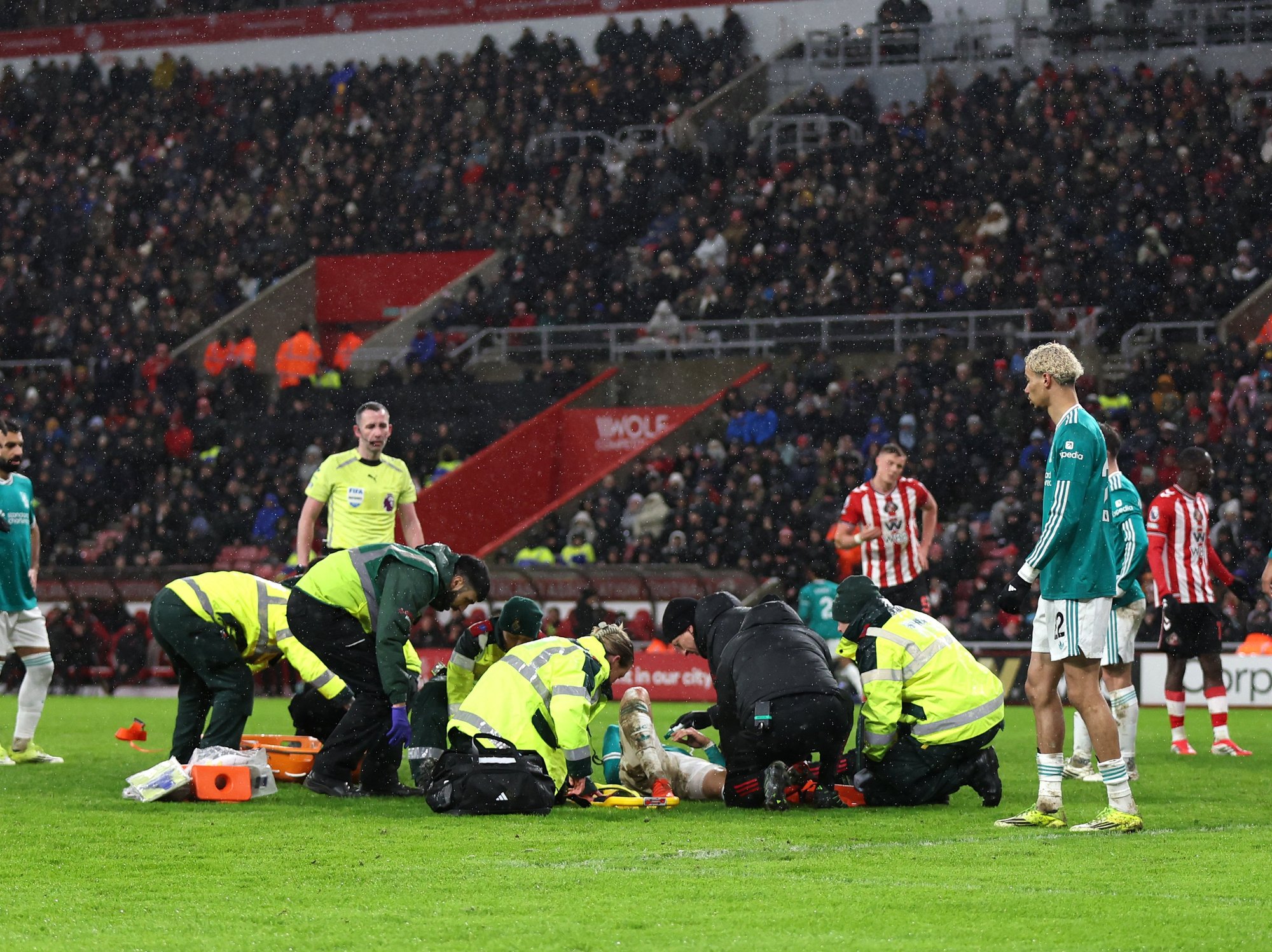 Liverpool star in tears after being stretchered off having been given oxygen on pitch in worrying scenes