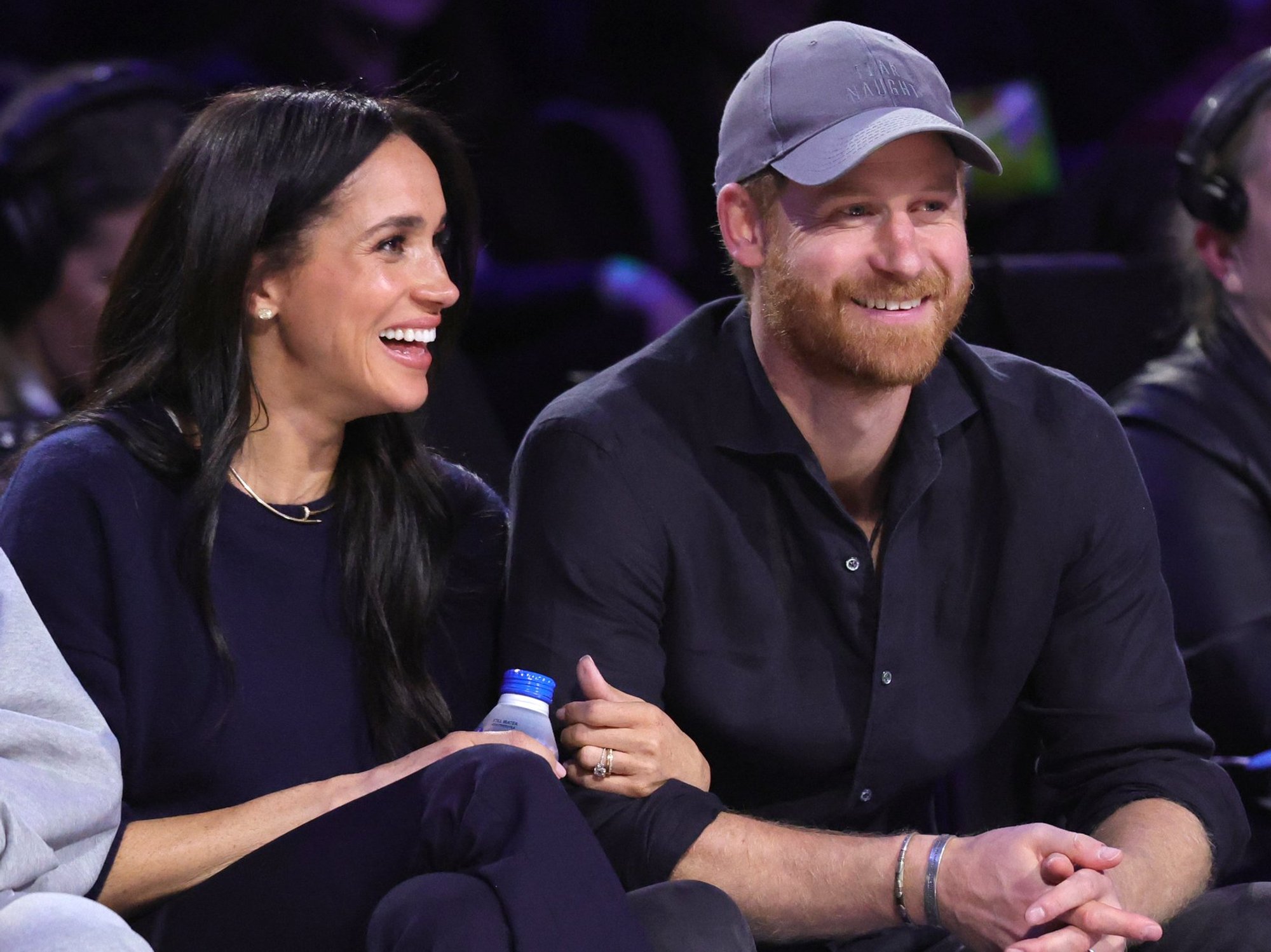 Prince Harry makes gesture to UK during new public appearance alongside Meghan Markle
