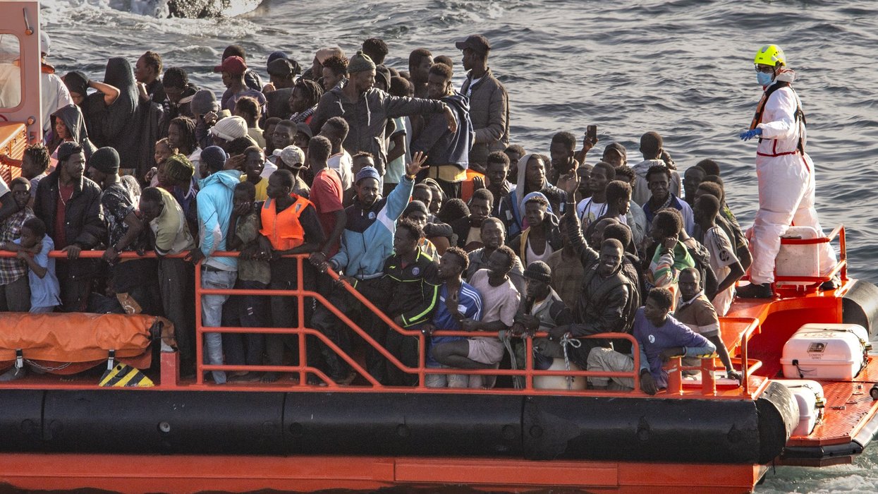 Spain 'will hand one MILLION illegal migrants legal status' under socialist PM's plans