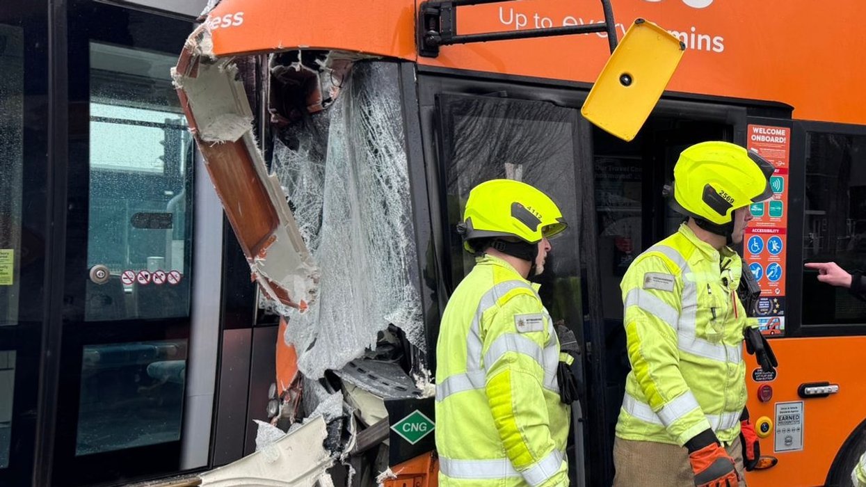 Bus and tram collide as emergency services rush to scene to treat passengers outside major UK city