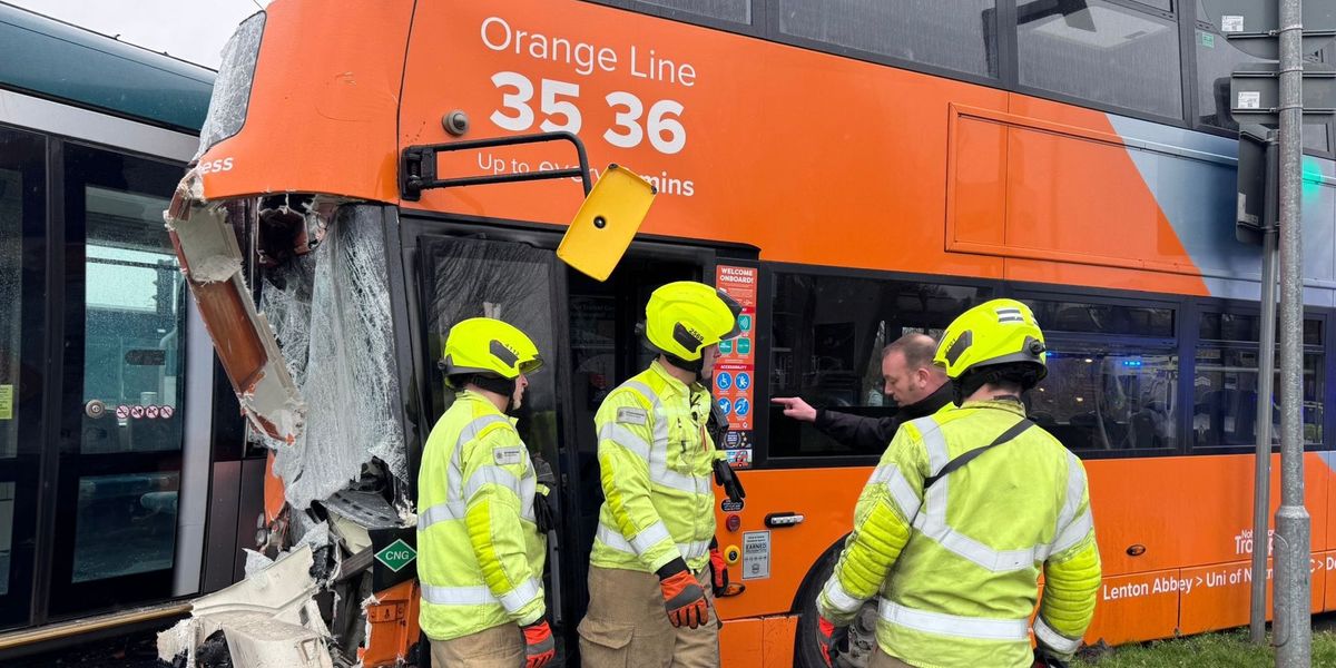 Bus and tram collide as emergency services rush to scene to treat passengers outside Nottingham Bus and tram collide as emergency services rush to scene to treat passengers outside Nottingham