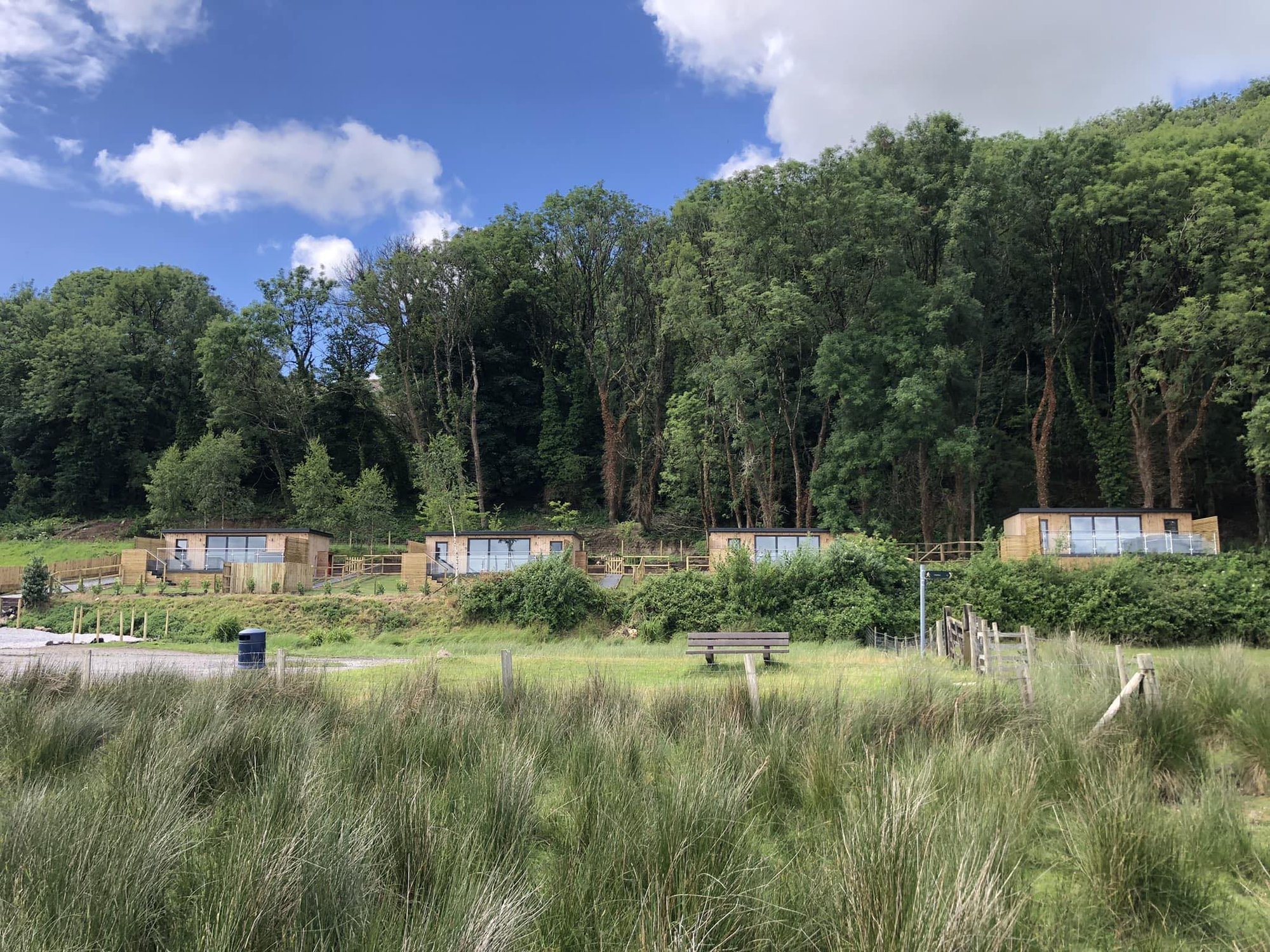 Planning row erupts after developer refuses to demolish Airbnb cabins deemed eyesore from public footpath