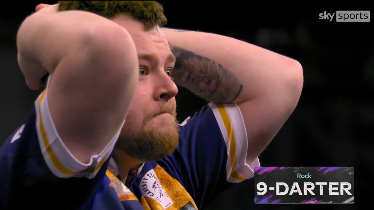 Josh Rock hits a nine-darter to send home Belfast crowd into a frenzy as he wipes away tears