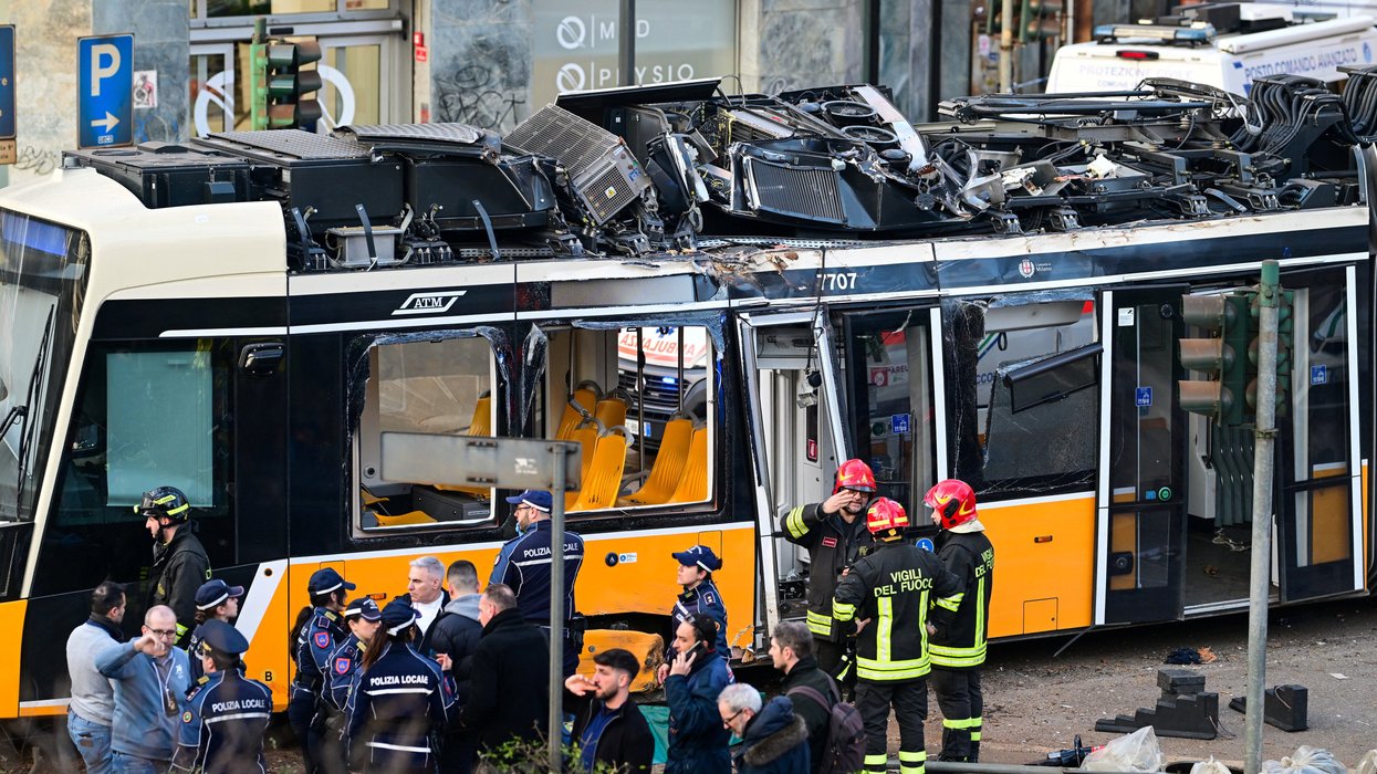 Two dead and dozens injured after Milan tram derails in horror crash