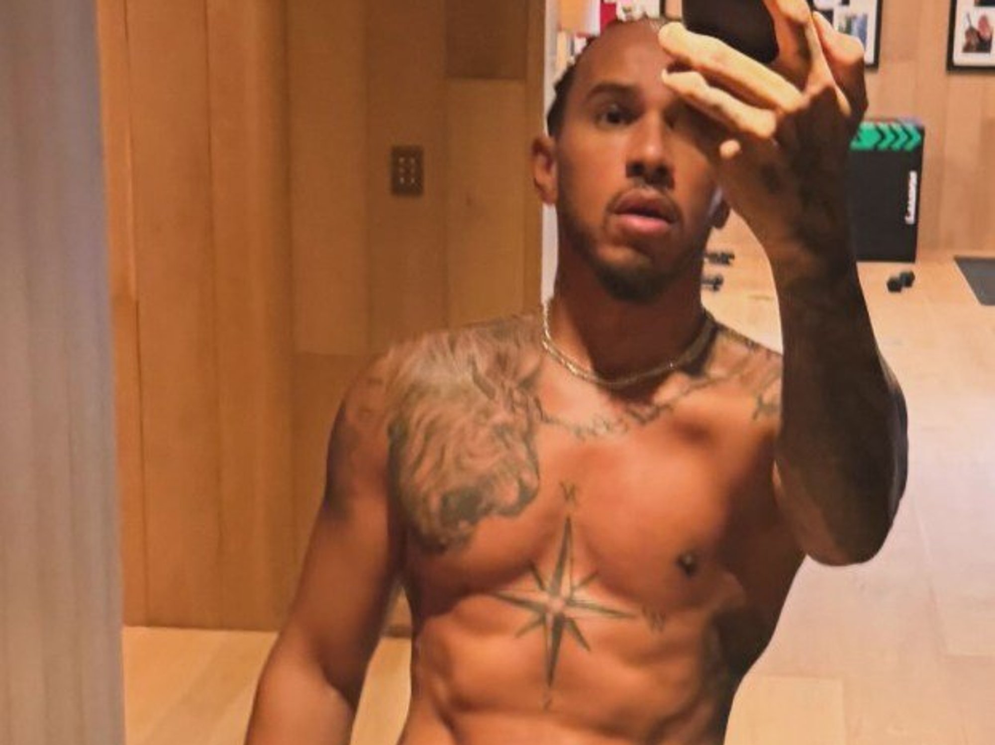 Lewis Hamilton shows off ripped physique just days before Australian Grand Prix