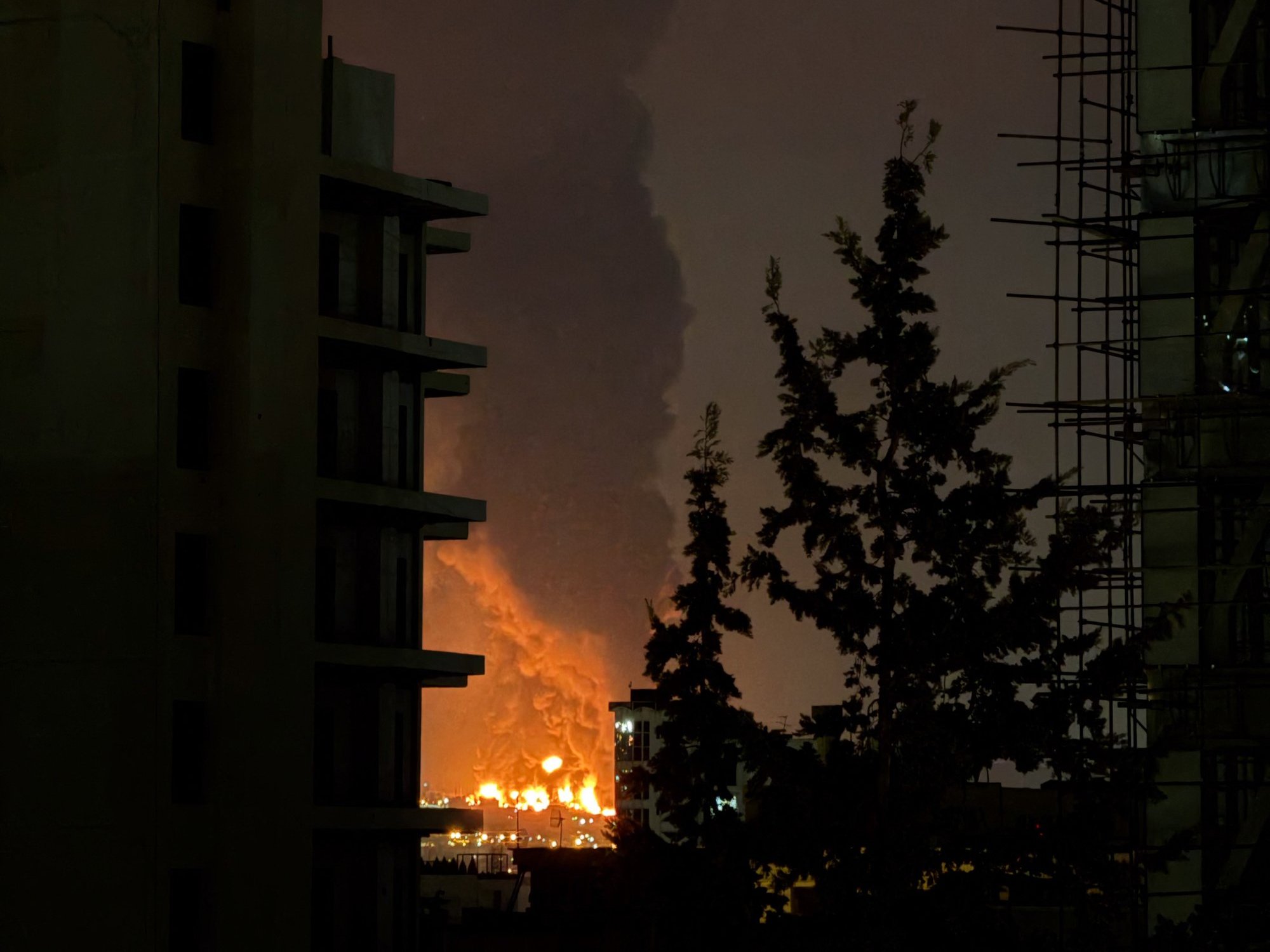 Massive fire above skies of Tehran as Israel strikes Iran oil depot