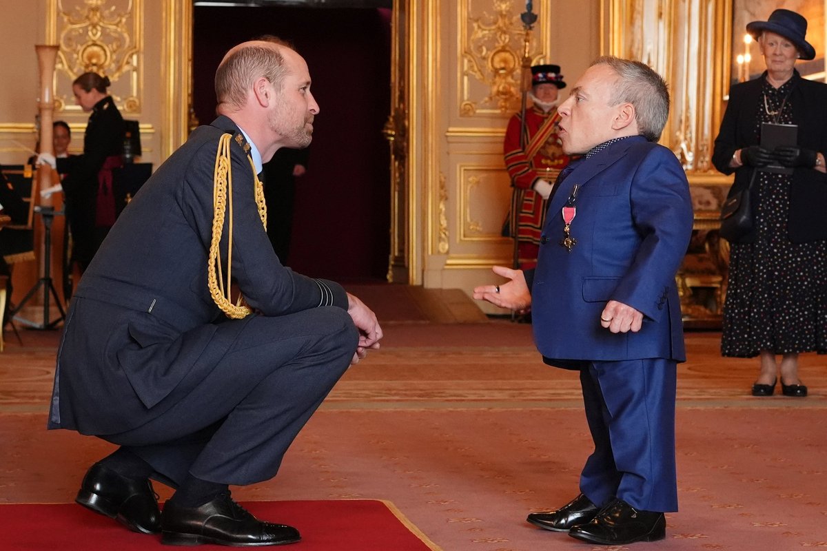 Warwick Davis praises Prince William for 'coming down to my level' in heartwarming moment at Windsor Castle