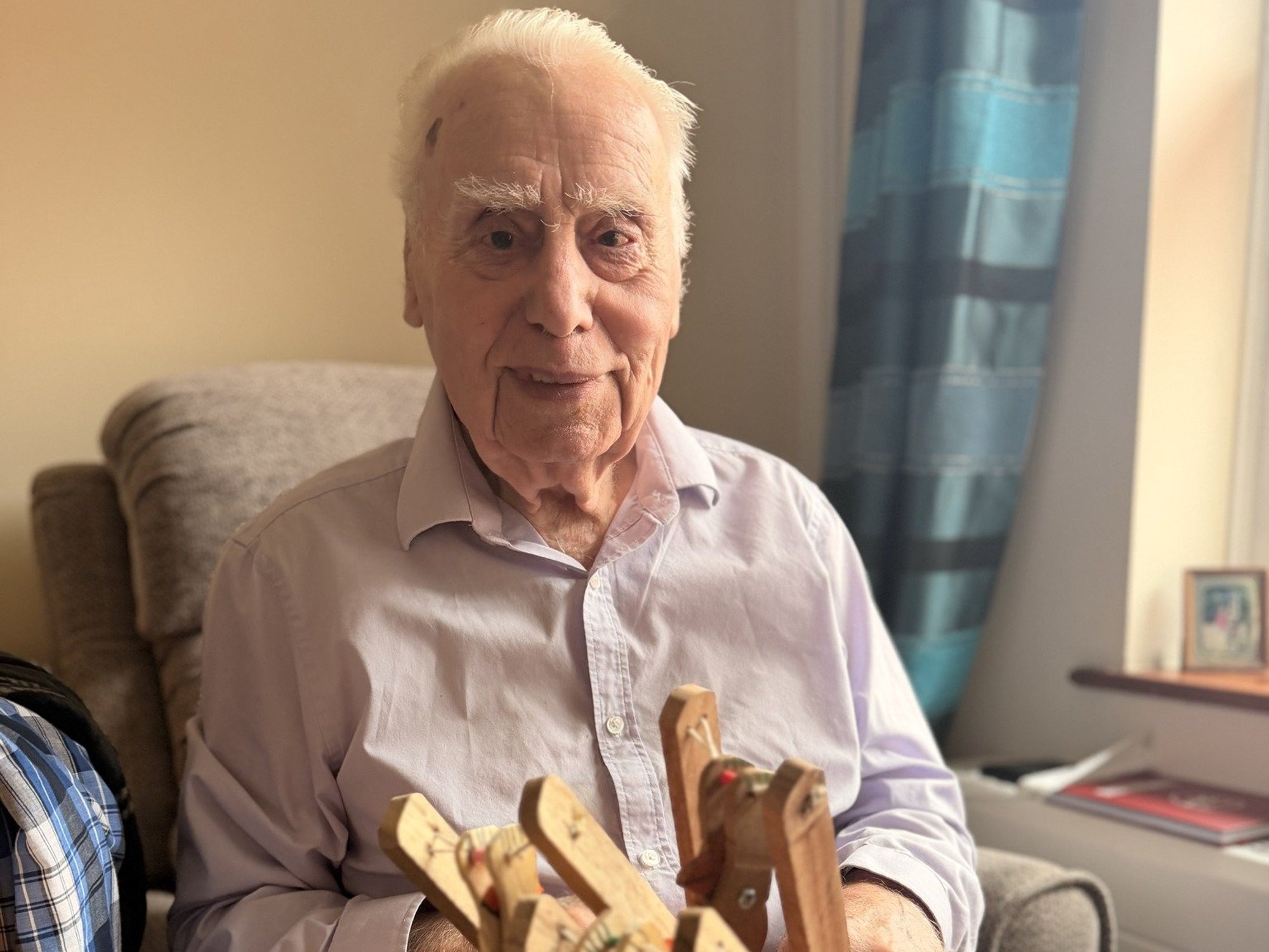 Pensioner, 91, donates 300 handmade wooden toys to charity - 'He wants to bring joy to everyone!'