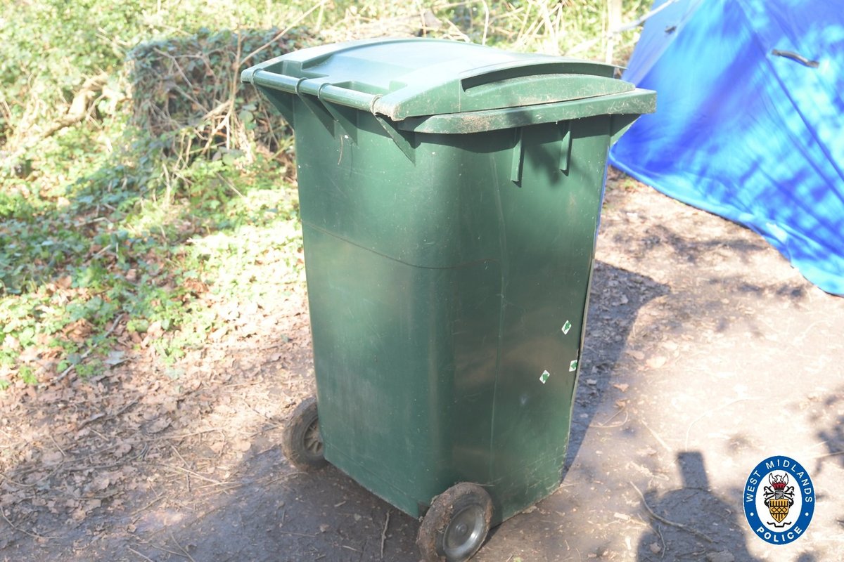 Three arrested after man's body found in green wheelie bin