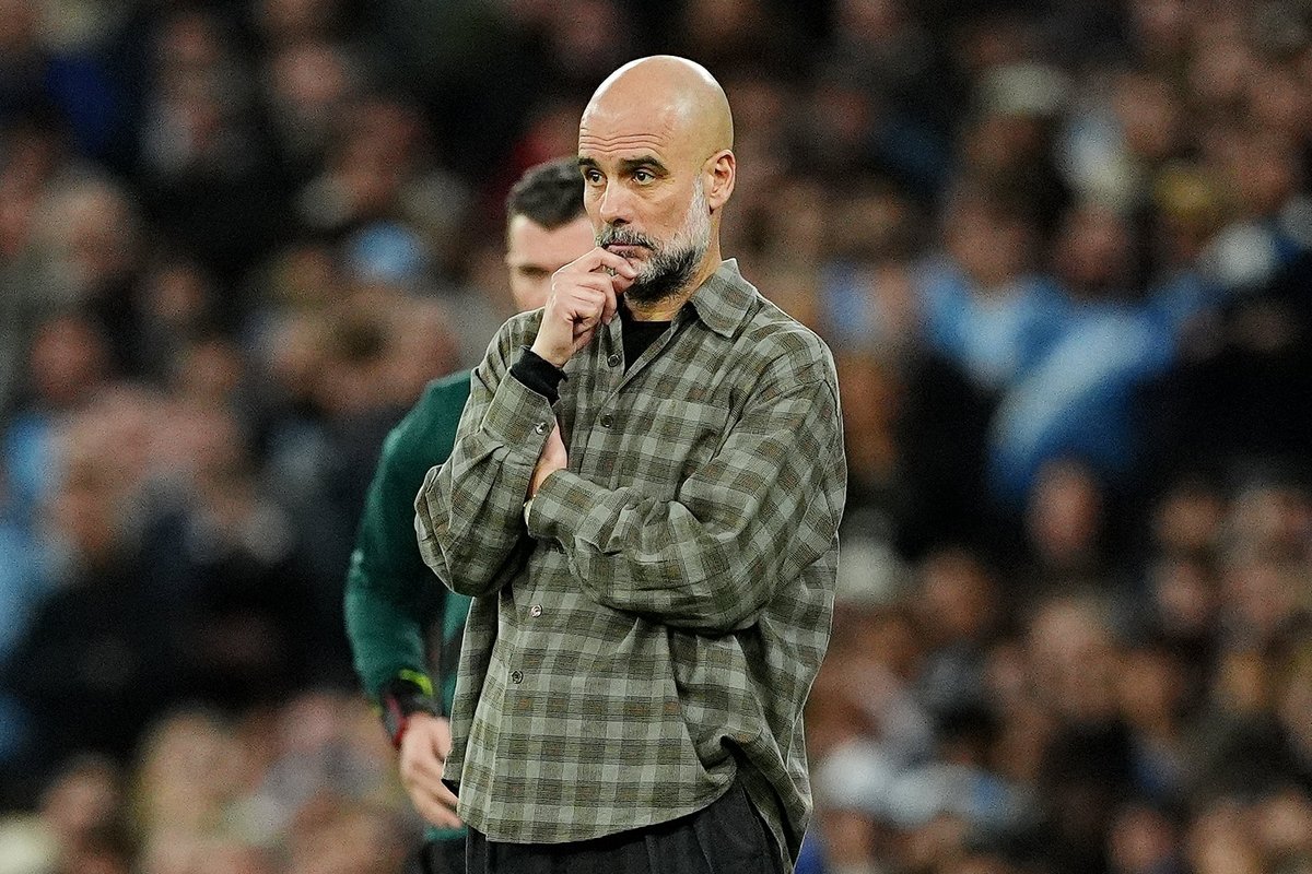 Pep Guardiola's outfit sparks backlash from football fans as Man City lose to Real Madrid in Champions League