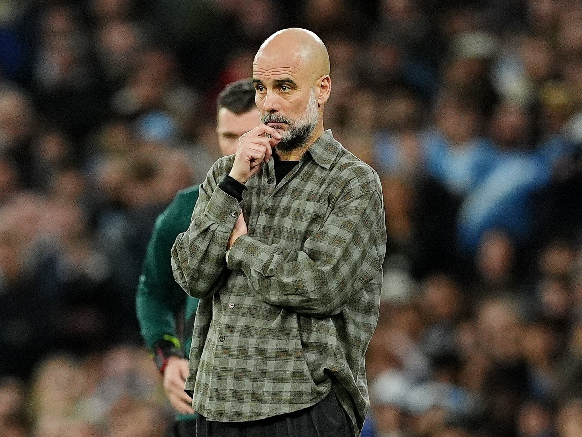 Pep Guardiola's outfit sparks backlash from football fans as Man City lose to Real Madrid in Cham...