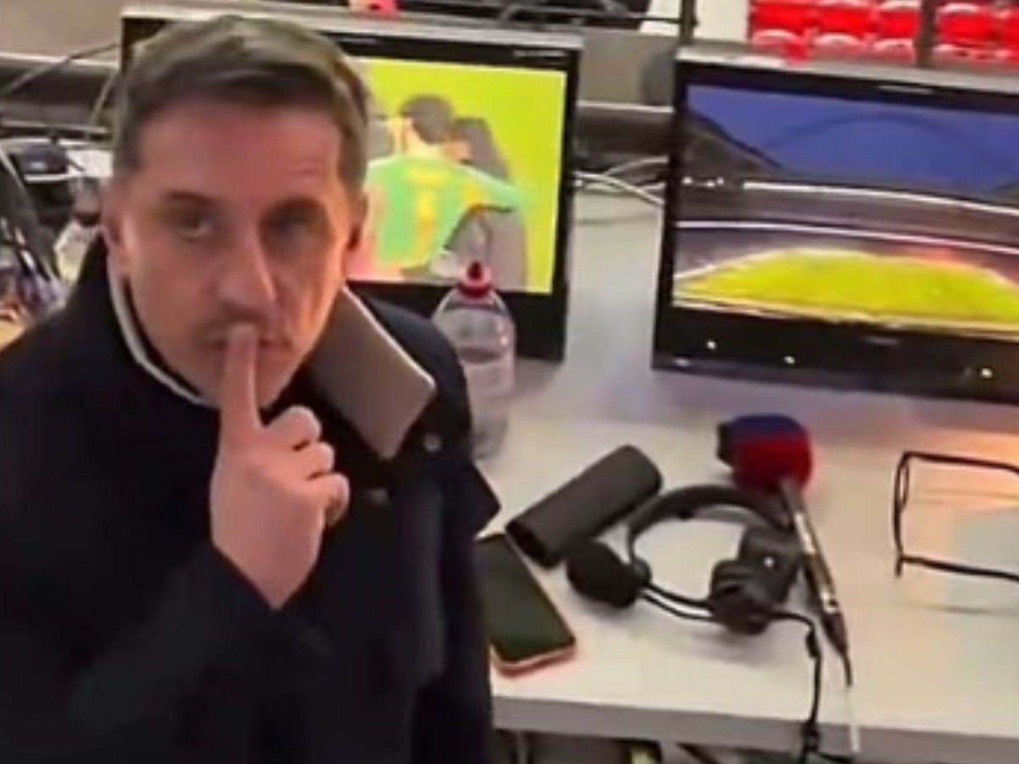 Gary Neville caught on camera responding to Man City fan after being hit with abuse in Carabao Cup final