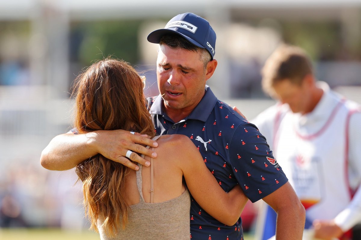 Golf star breaks down in tears and hugs wife after winning first tournament since life-or-death surgery