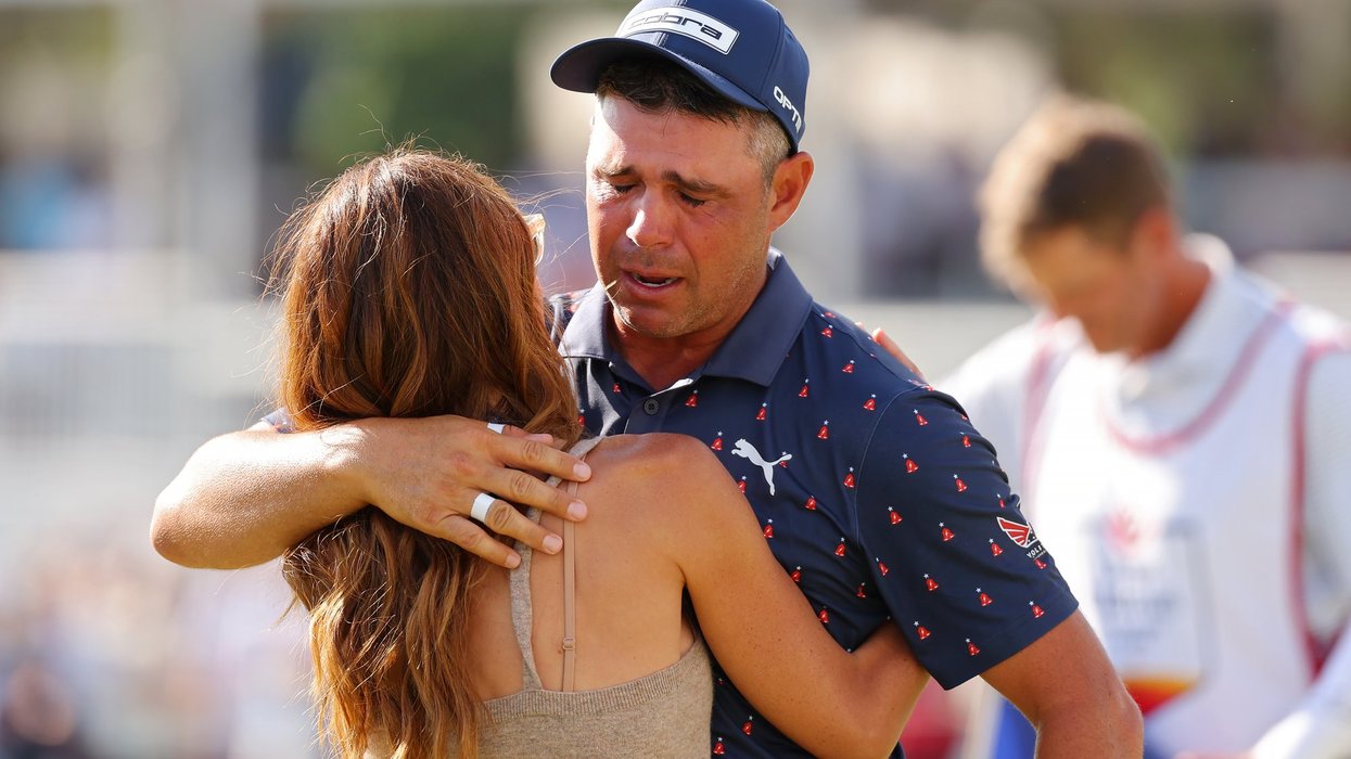 Golf star breaks down in tears and hugs wife after winning first tournament since life-or-death surgery