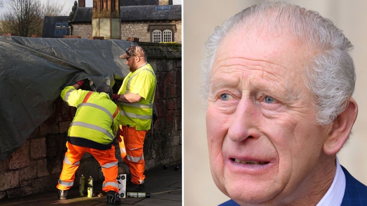 Workers rush to remove 'Not Our King' graffiti before monarch and Queen Camilla arrive at royal event