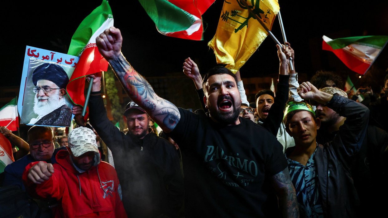 Iran warns Donald Trump: 'Our fingers are on the trigger' - but AGREES to open Strait of Hormuz