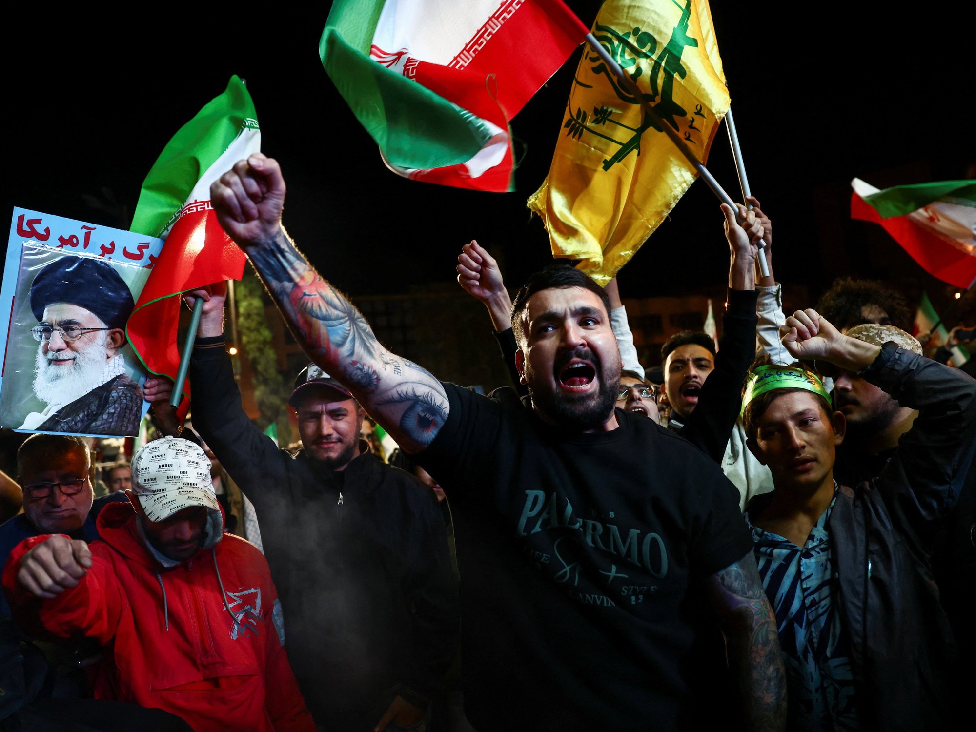 Iran warns Donald Trump: 'Our fingers are on the trigger' - but AGREES to open Strait of Hormuz