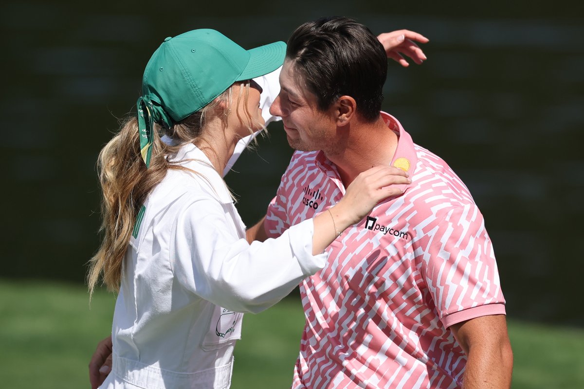 Golf's 'forever single' star goes public with new girlfriend at Masters