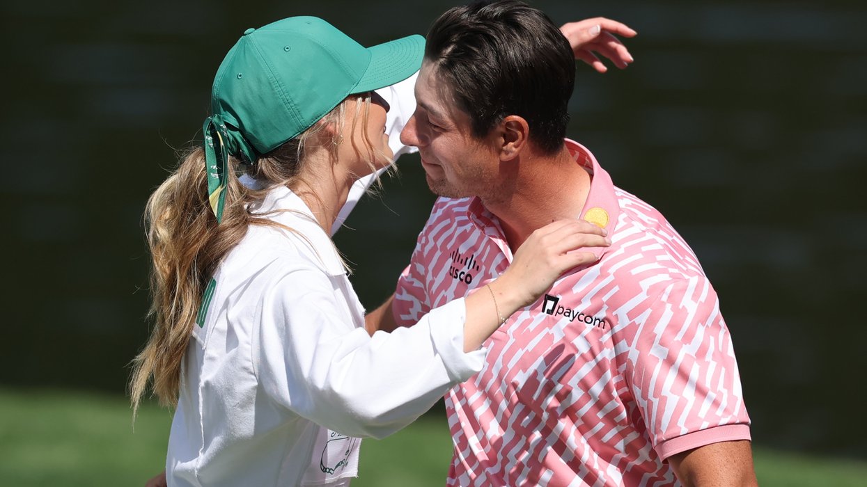 Golf's 'forever single' star goes public with new girlfriend at Masters