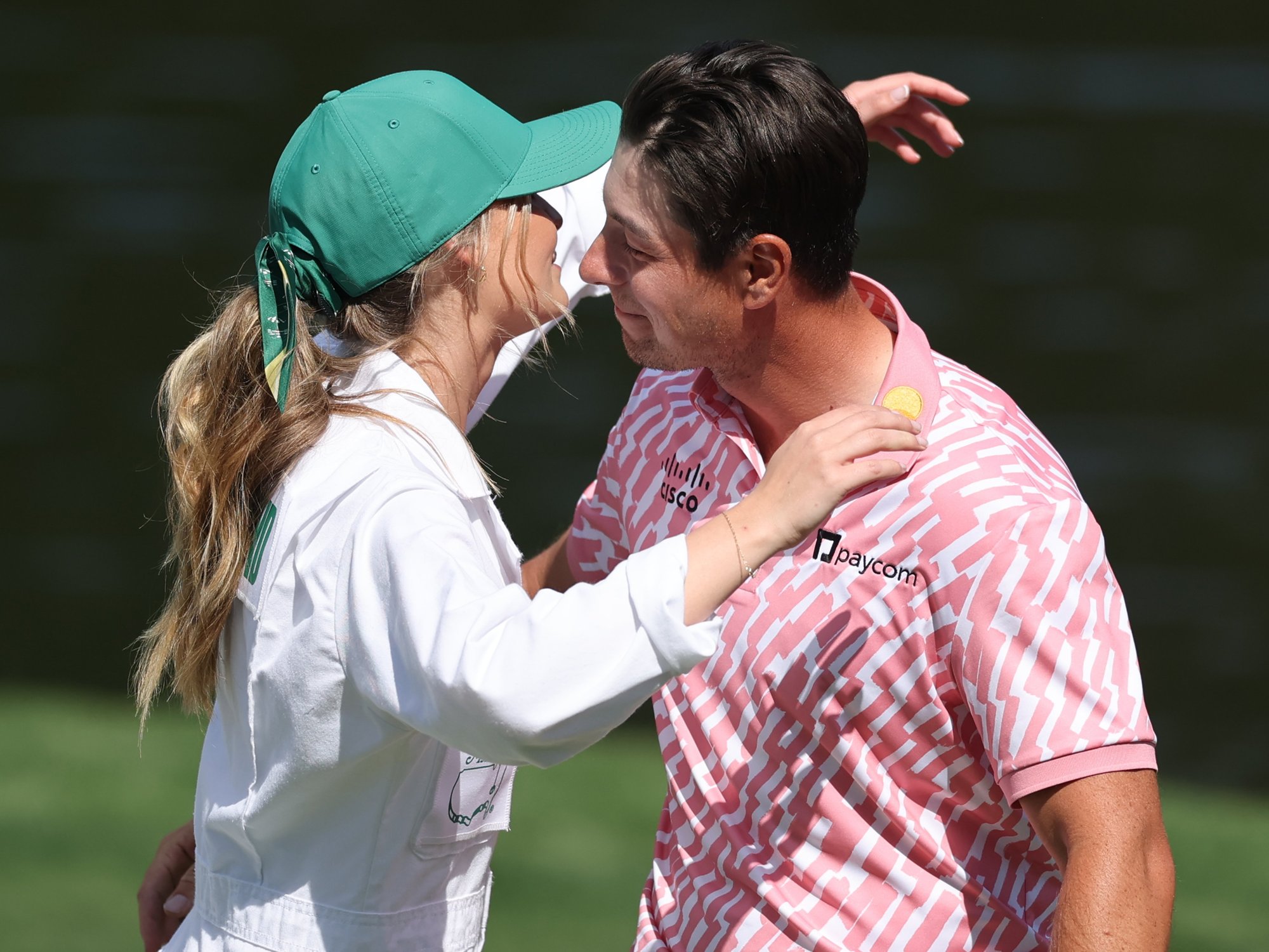 Golf's 'forever single' star goes public with new girlfriend at Masters