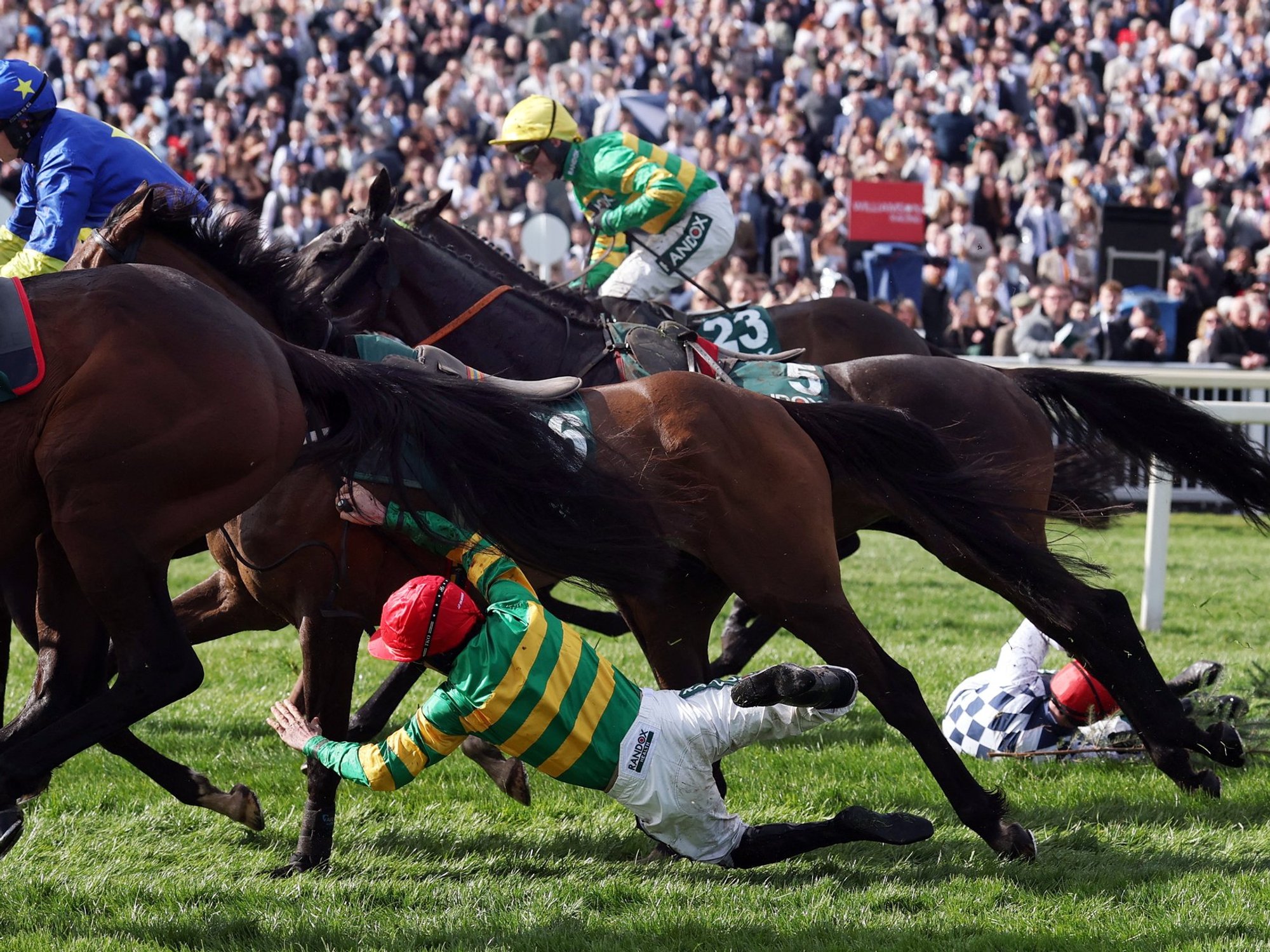 Grand National jockey 'rushed to hospital' after serious fall as health update released