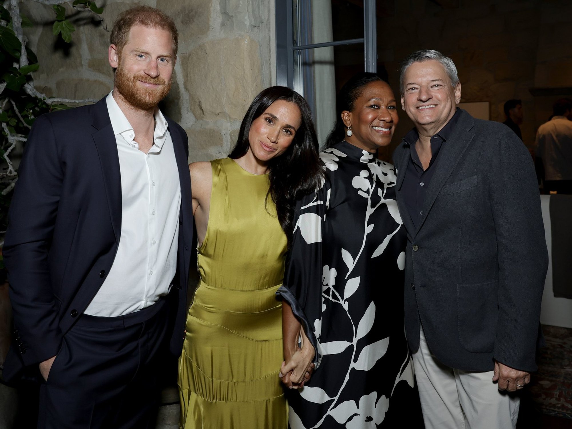 Meghan Markle holds hand with wife of Netflix CEO as Sussexes move on from professional separation