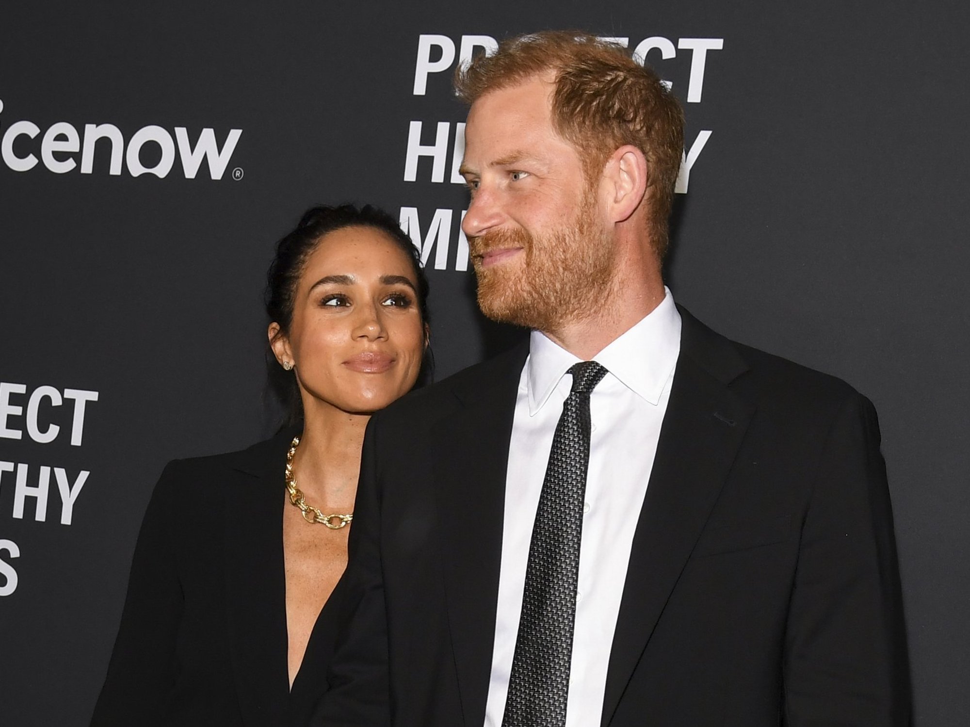 Harry and Meghan unveil details of four-day Australian tour and confirm Archie and Lilibet will r...
