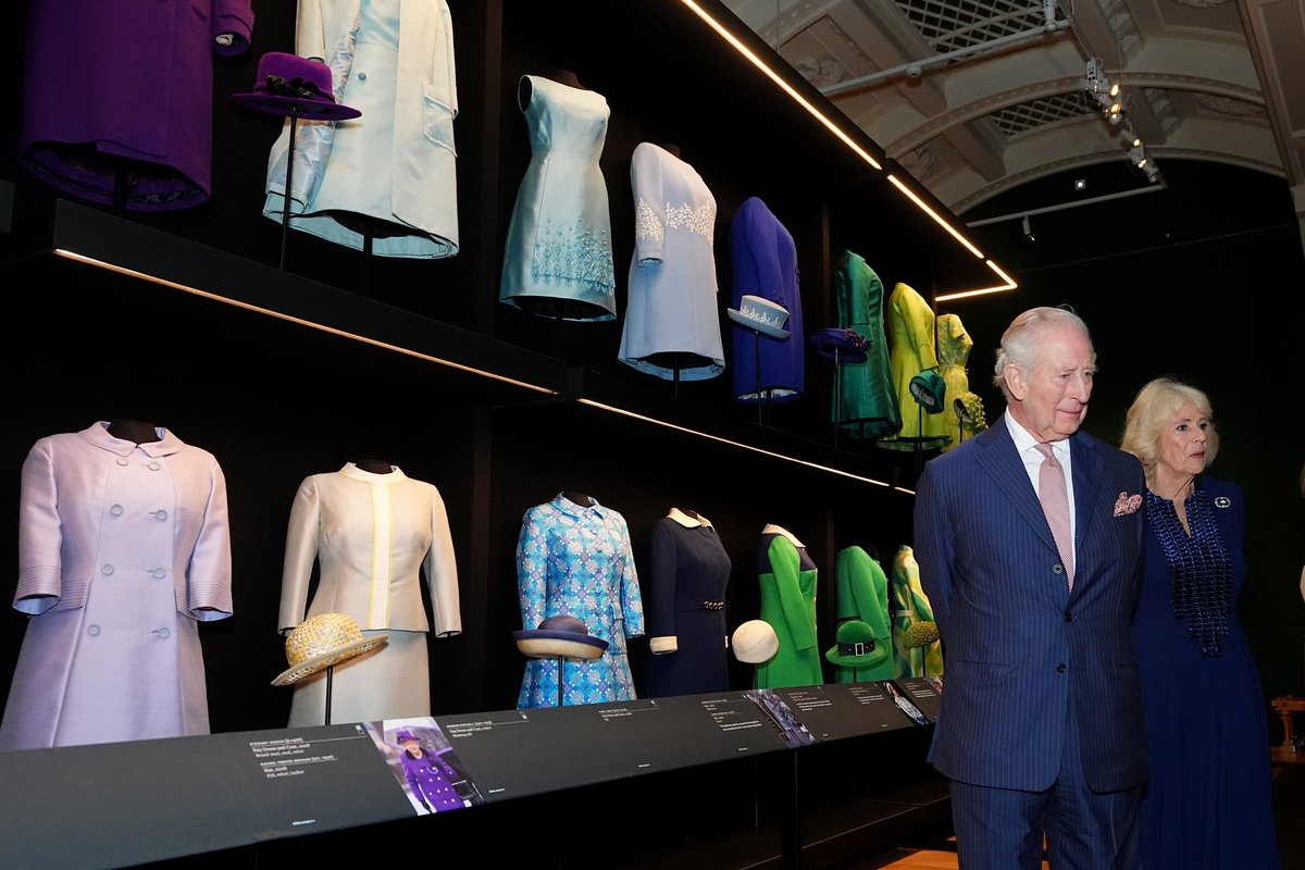 King Charles chuckles as he visits 'quirky' Queen Elizabeth II fashion exhibition to mark late monarch's 100th birthday
